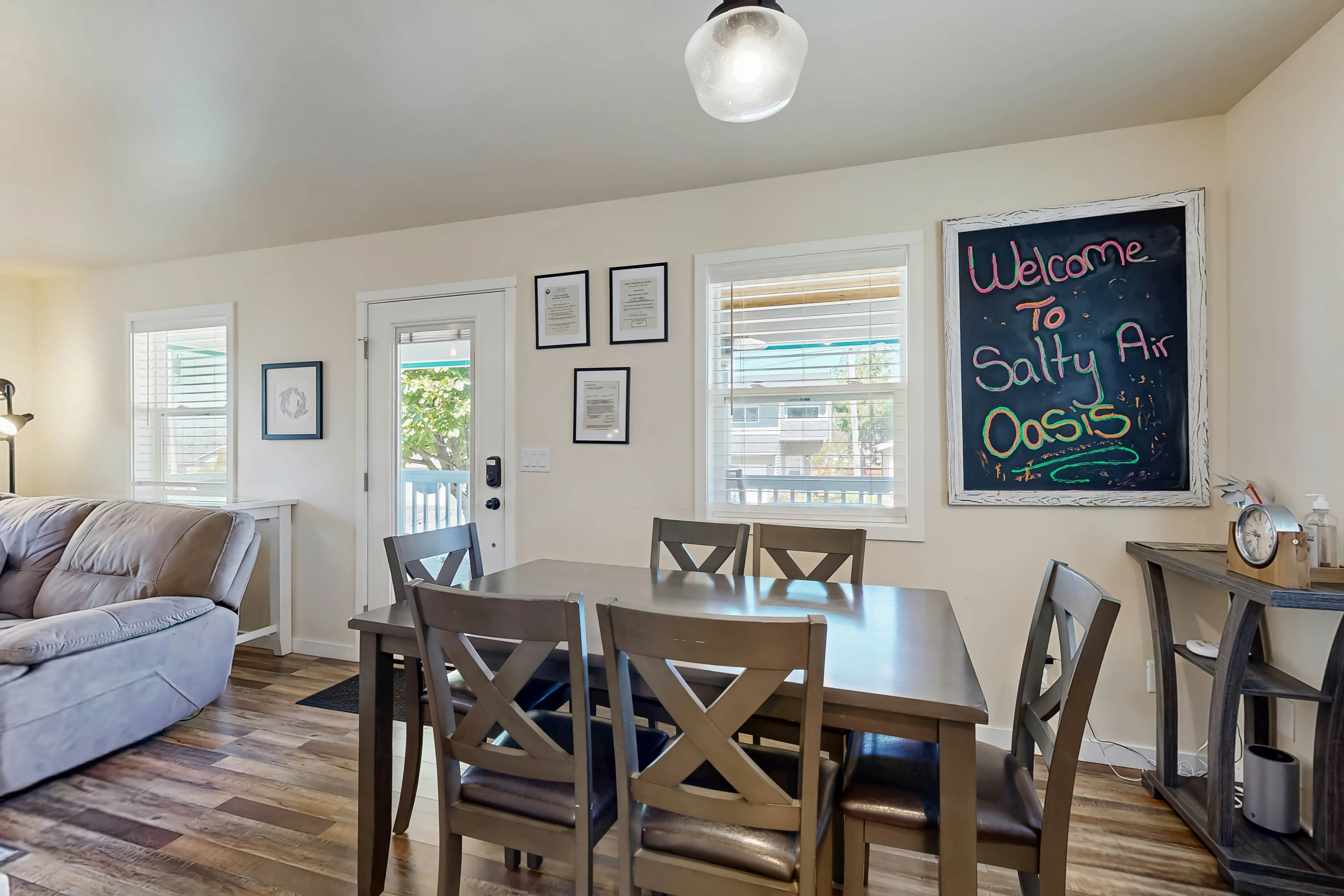 Modern Beach Cottage with a covered patio fire pit grill and easy beach access