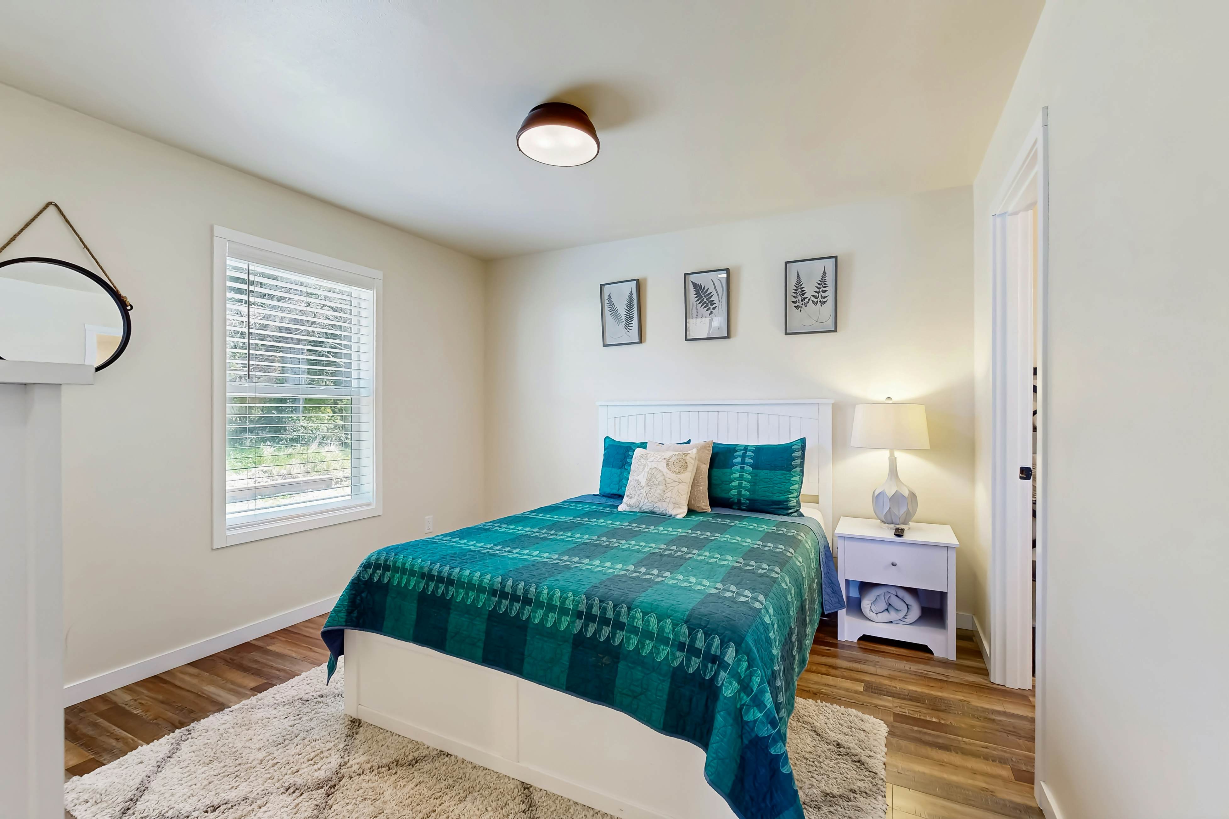 Modern Beach Cottage with a covered patio fire pit grill and easy beach access