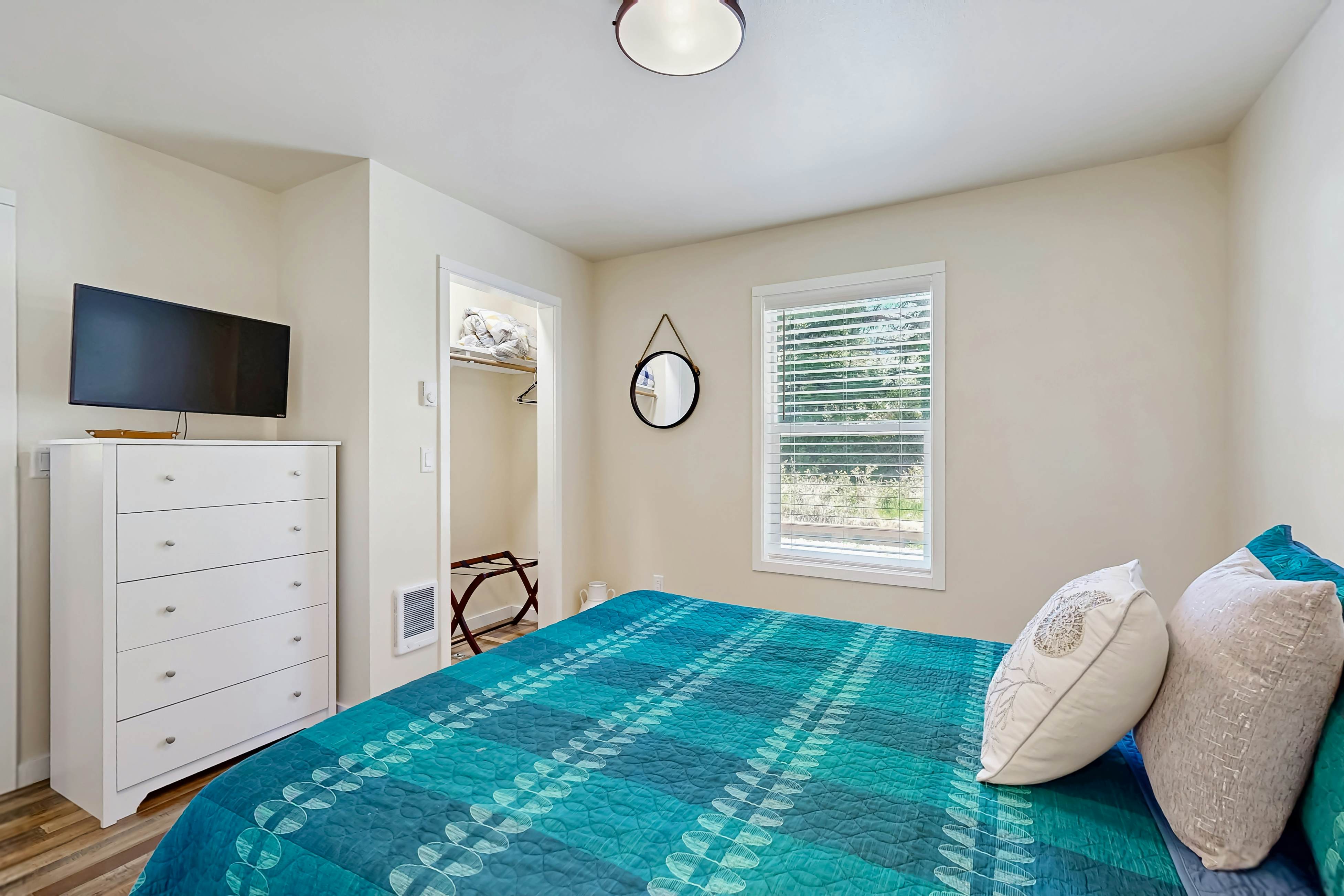 Modern Beach Cottage with a covered patio fire pit grill and easy beach access