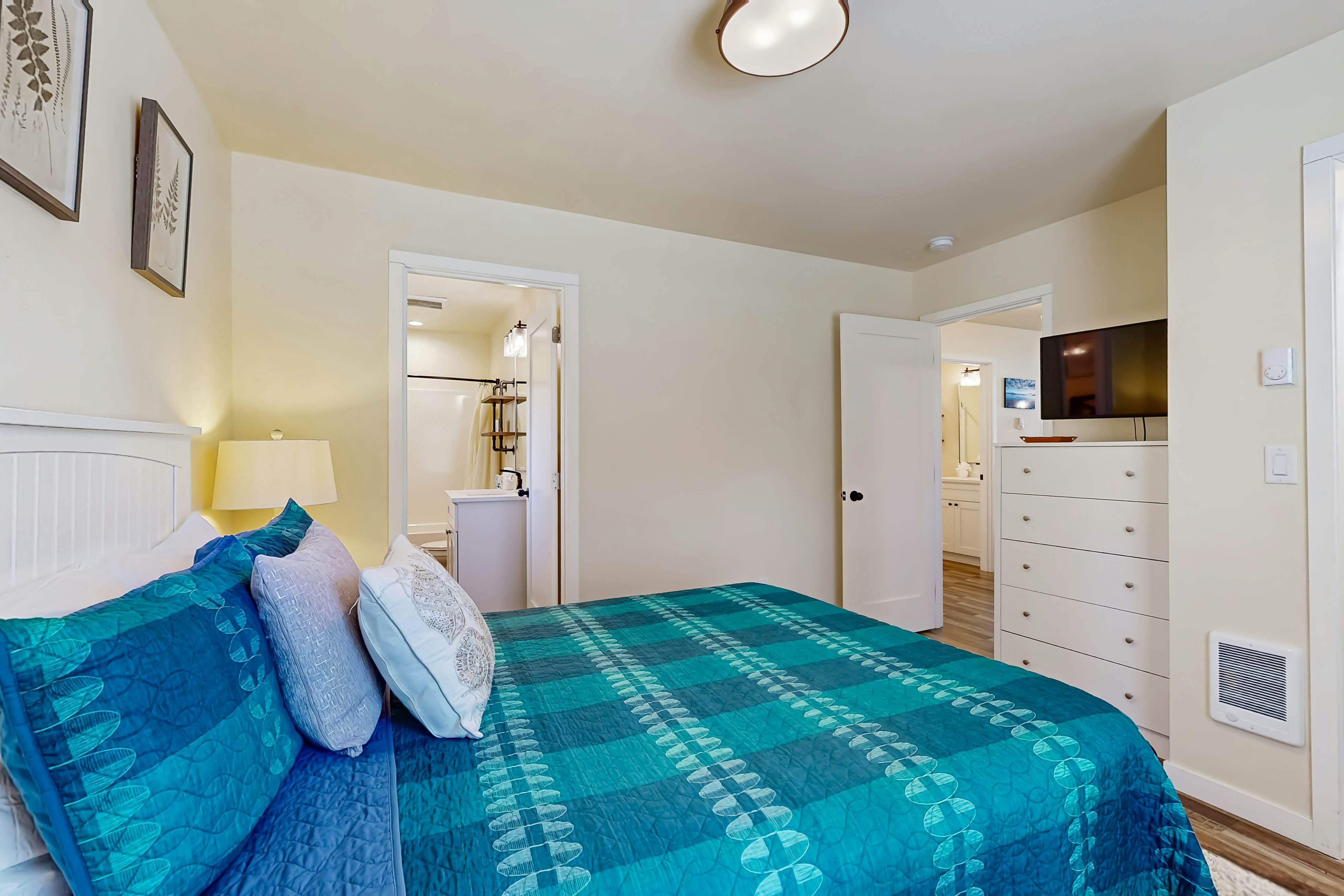 Modern Beach Cottage with a covered patio fire pit grill and easy beach access