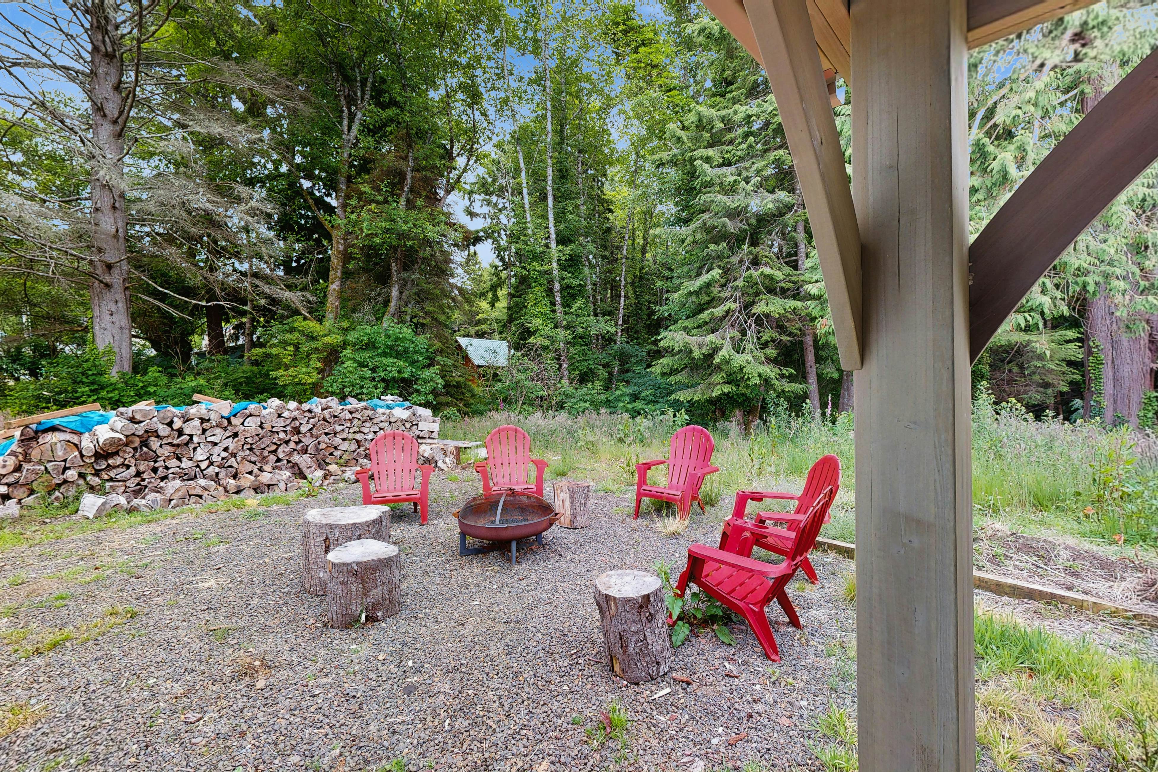 Modern Beach Cottage with a covered patio fire pit grill and easy beach access