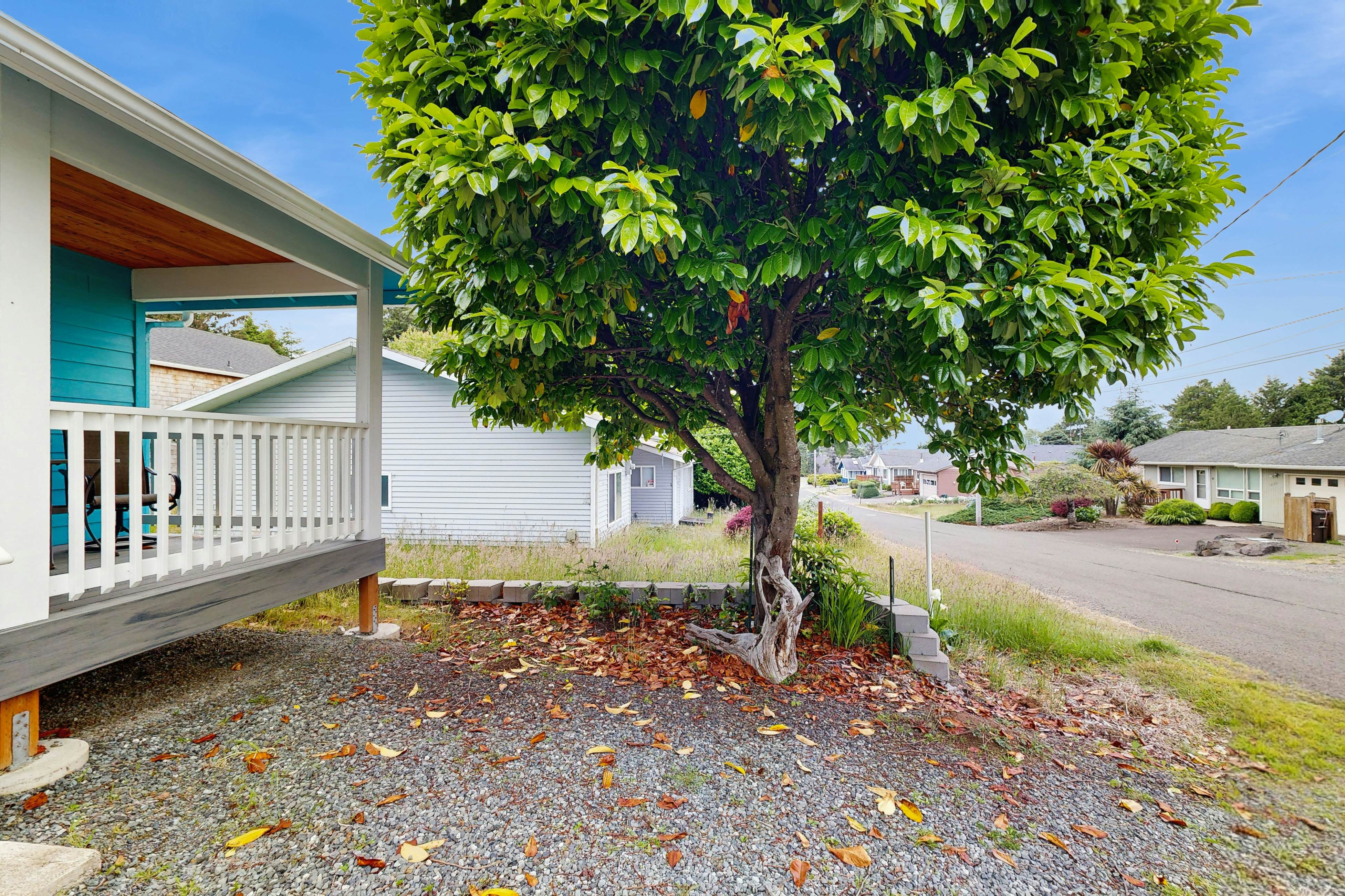 Modern Beach Cottage with a covered patio fire pit grill and easy beach access