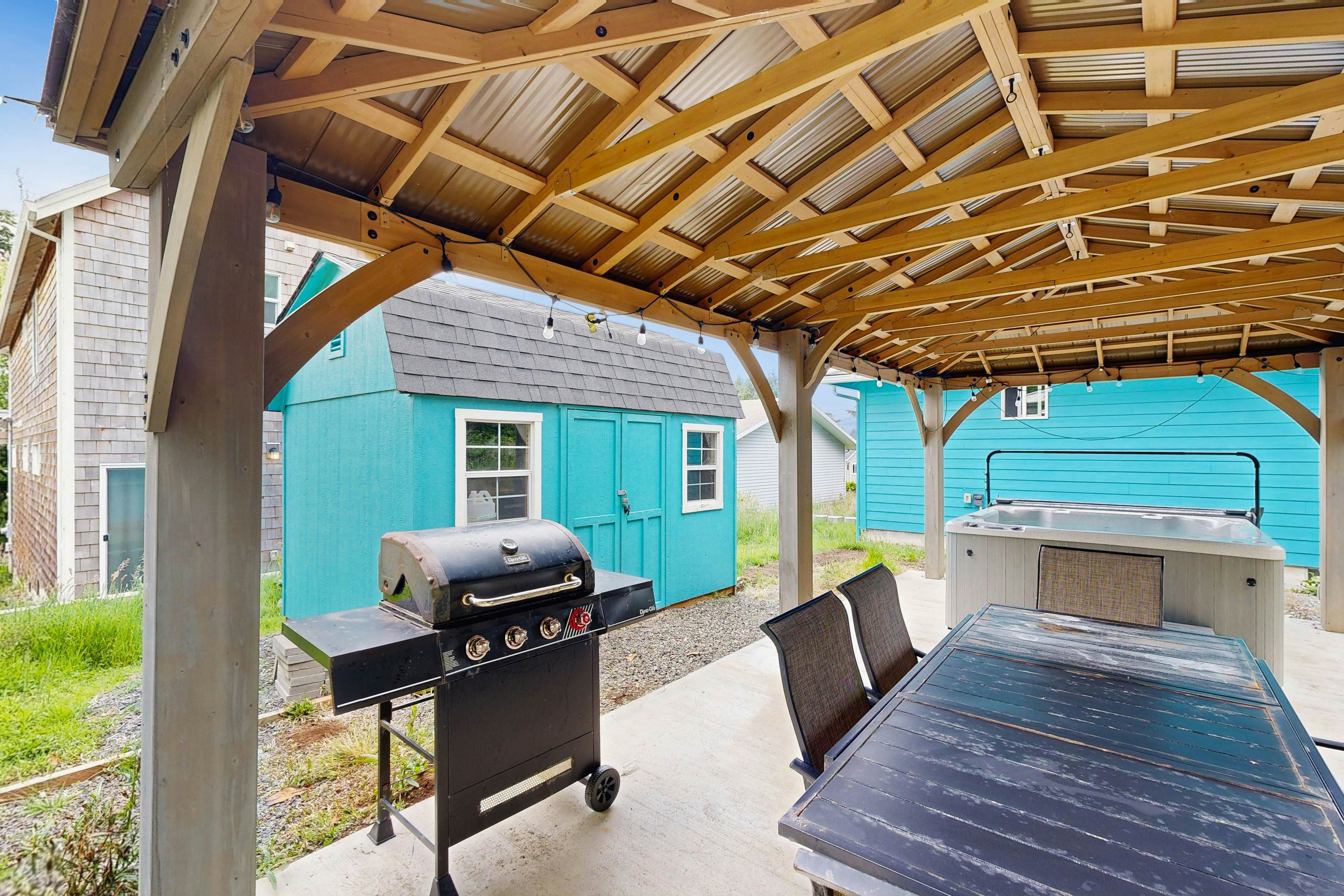 Modern Beach Cottage with a covered patio fire pit grill and easy beach access