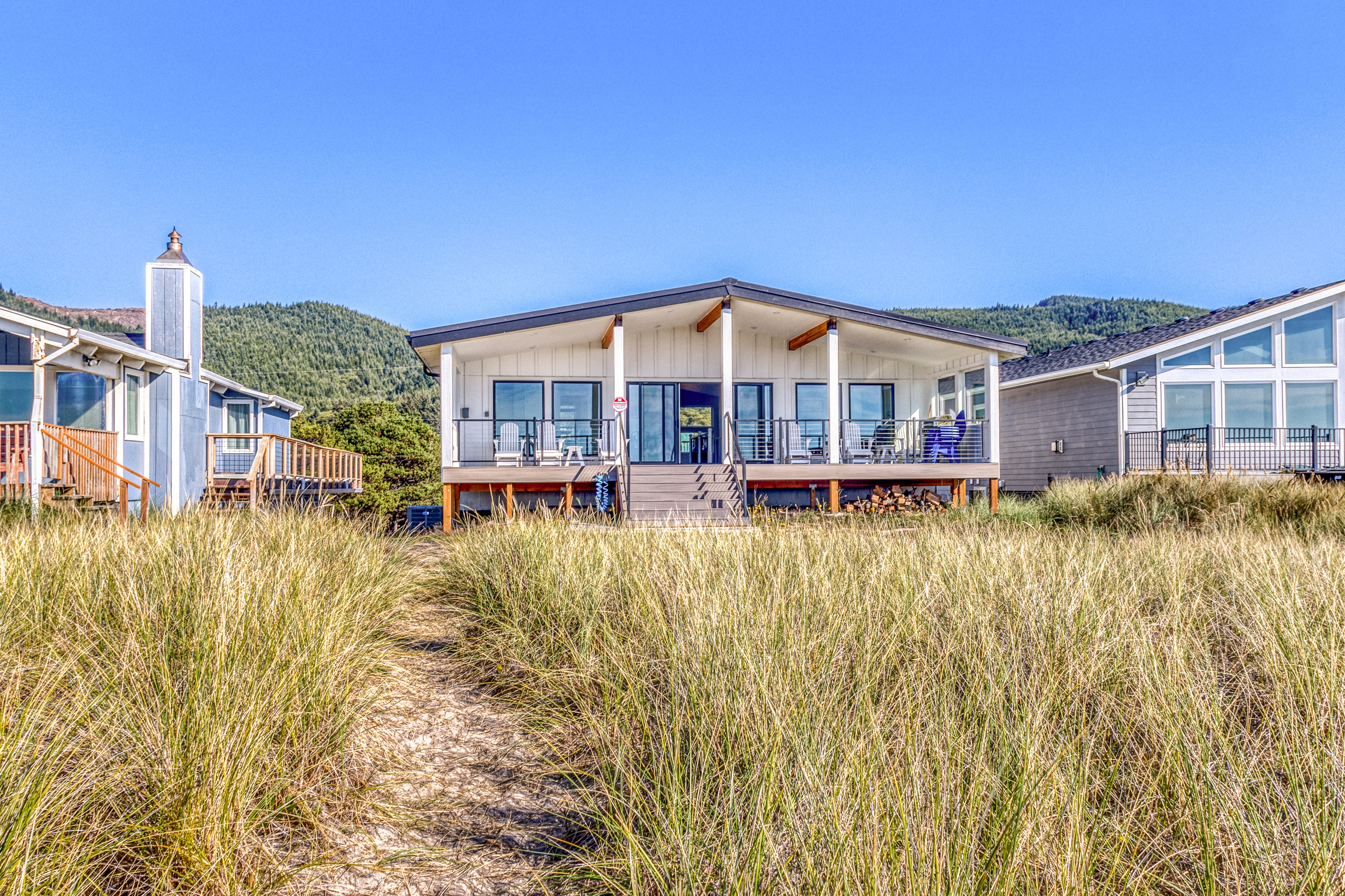 Beautiful beachfront home with huge ocean view beach access and large deck