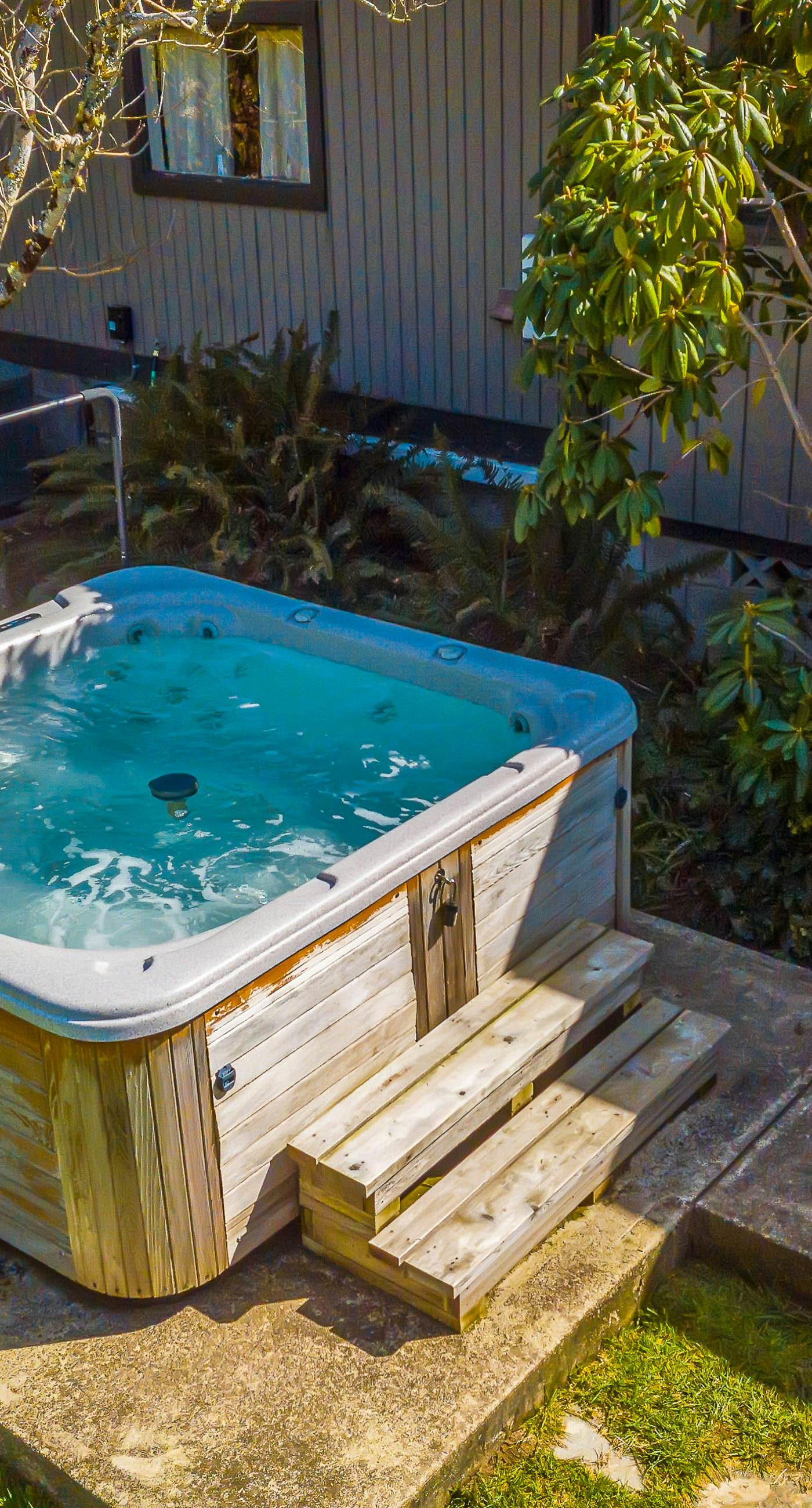 Delightful dog friendly home with bay views private hot tub and sauna