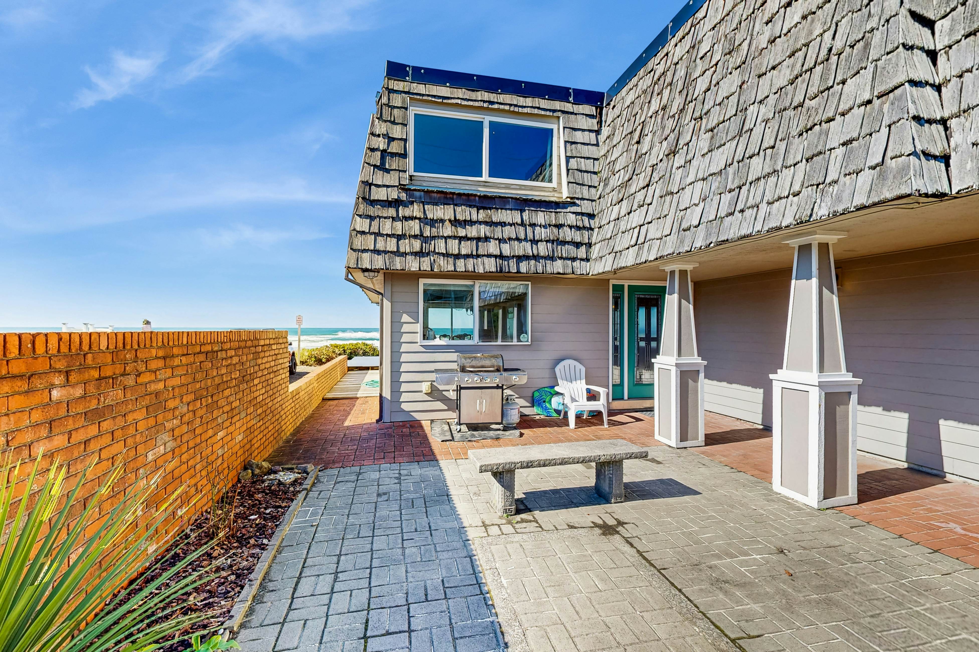 Oceanfront home with a washer dryer and beach access
