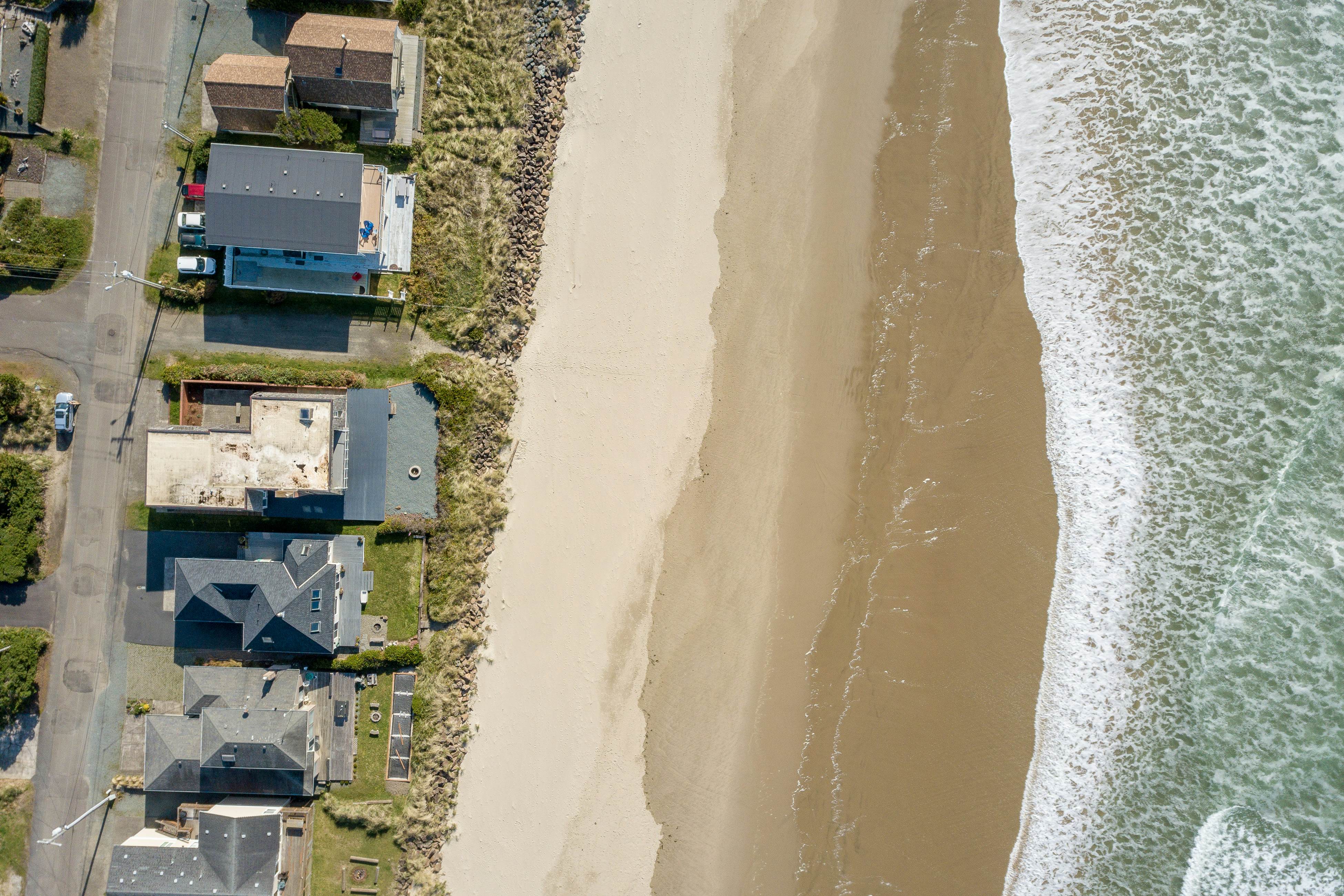 Oceanfront home with a washer dryer and beach access
