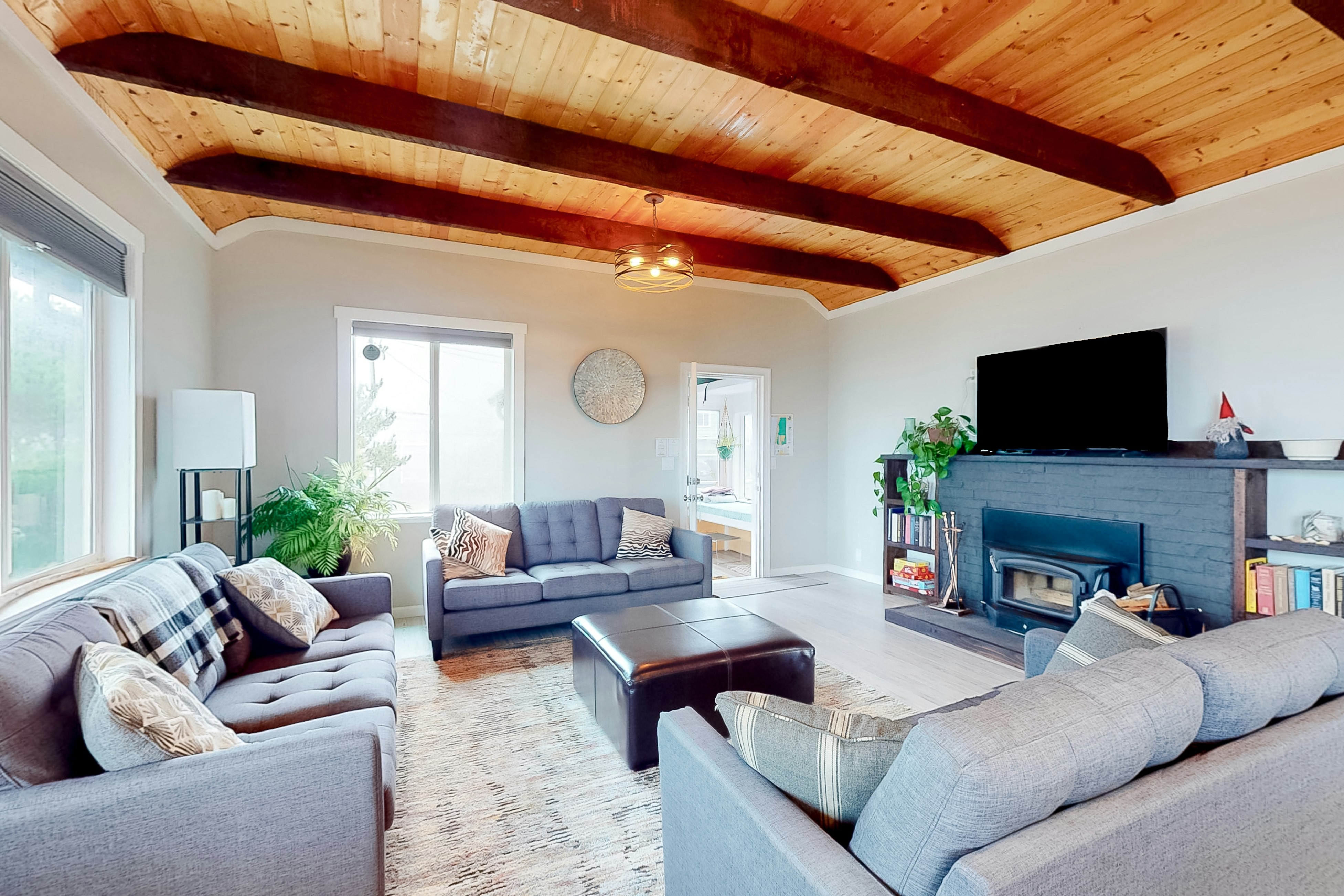 Dog-friendly beach house with ocean views & furnished deck - steps from beach