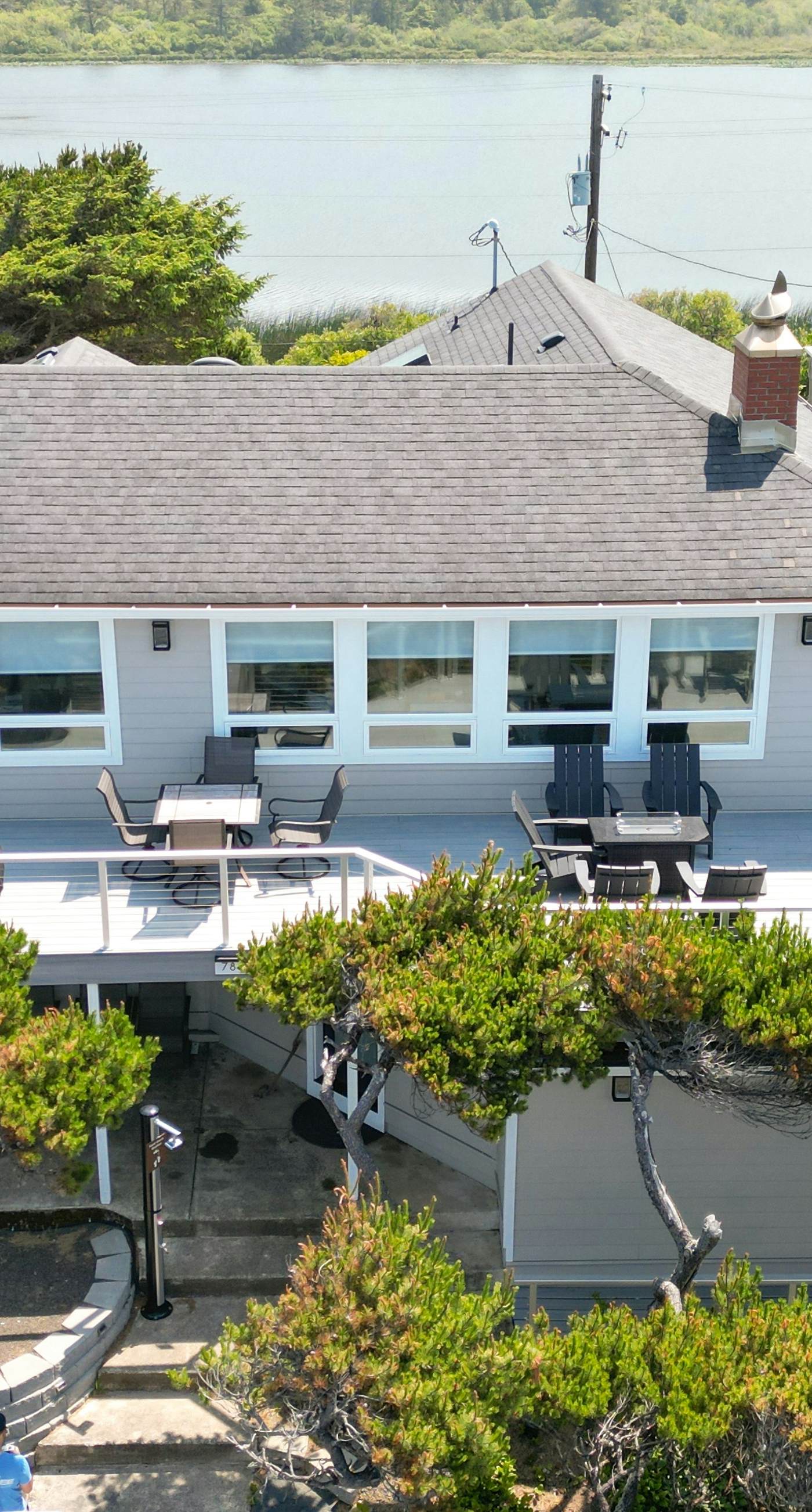 Renovated lake ocean view retreat with hot tub outdoor living and fireplace