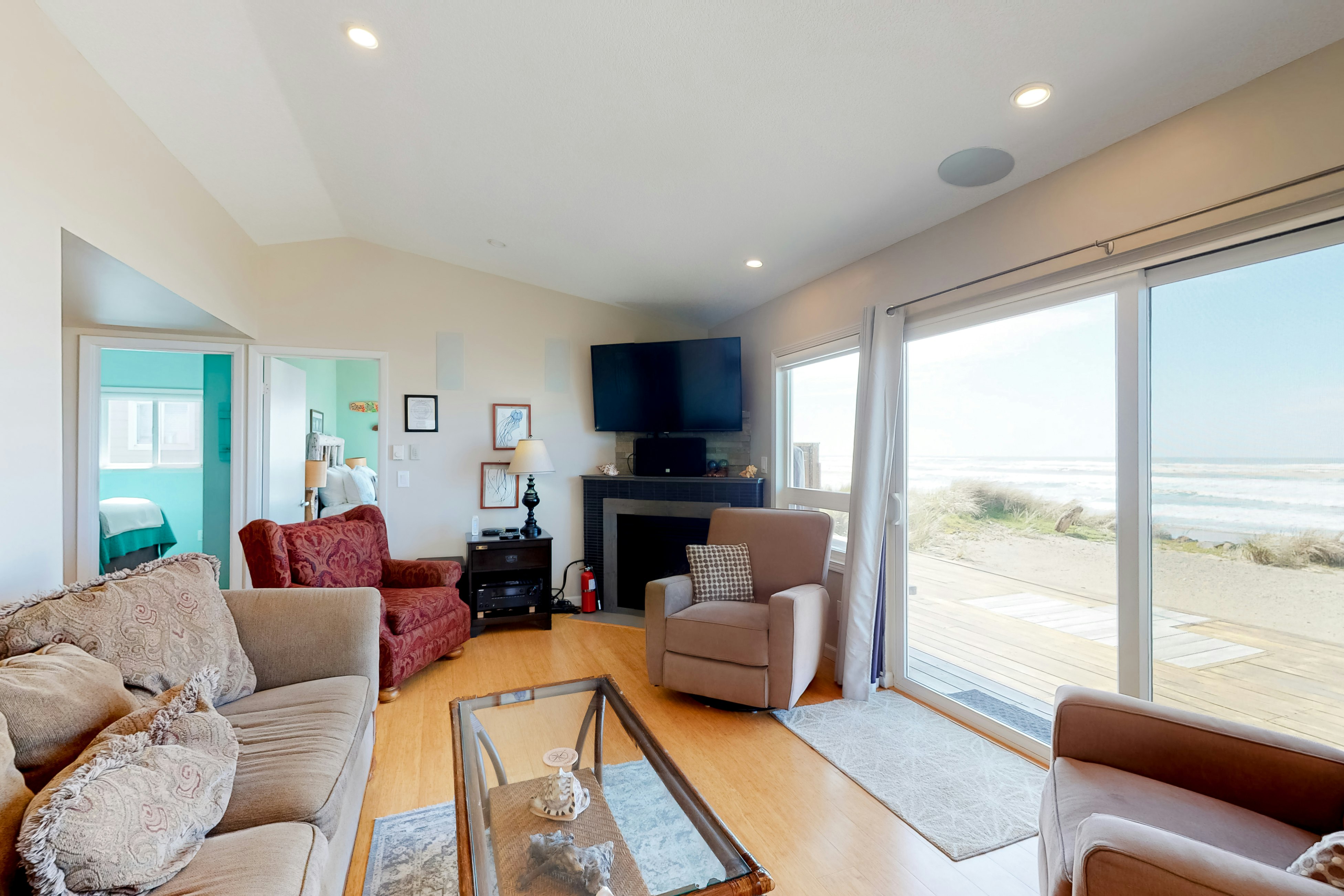 Beachfront home with ocean-facing deck & ocean views throughout - modern kitchen