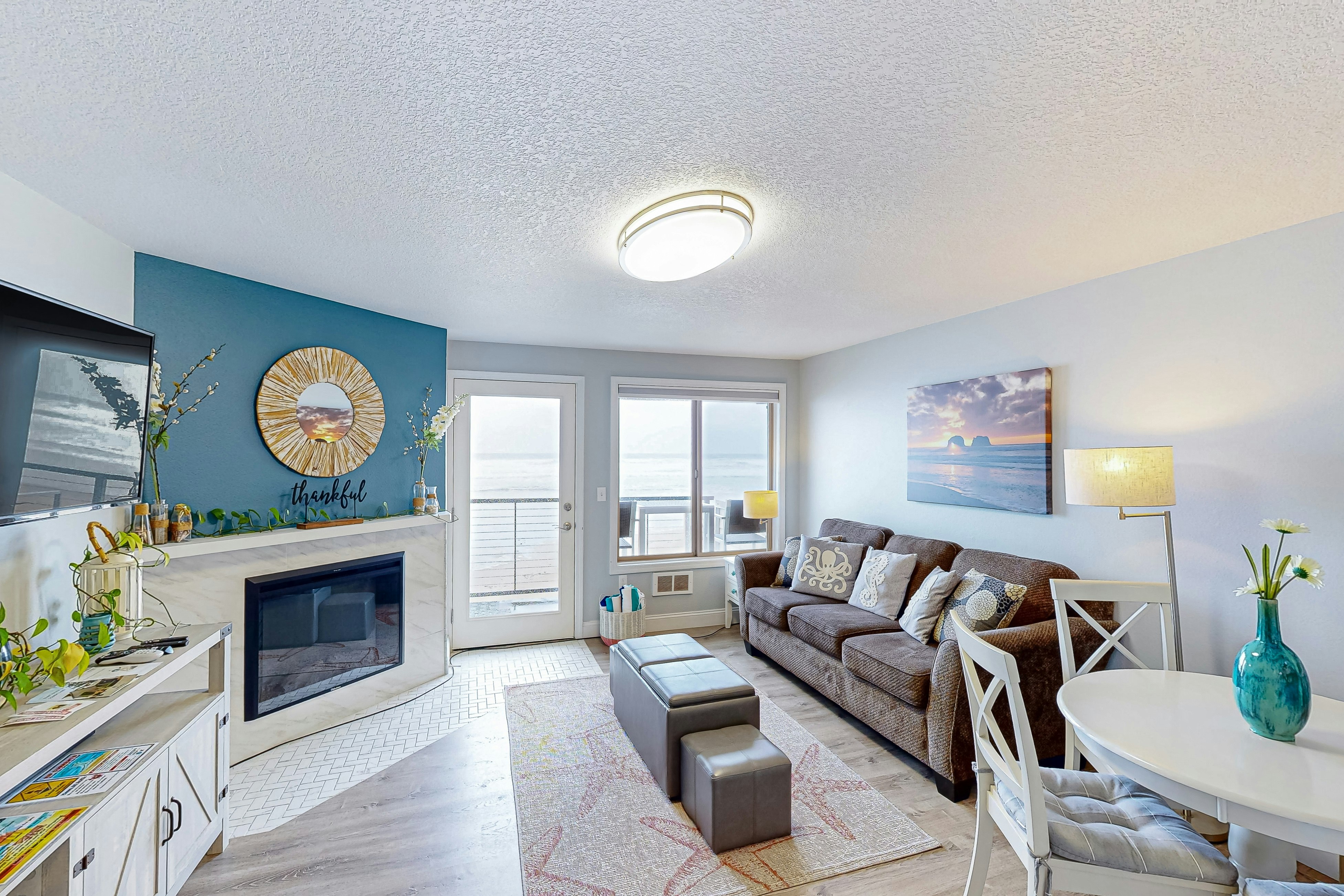 Rock Creek Inn condo on beach with ocean-view balcony - walk to shops & dining