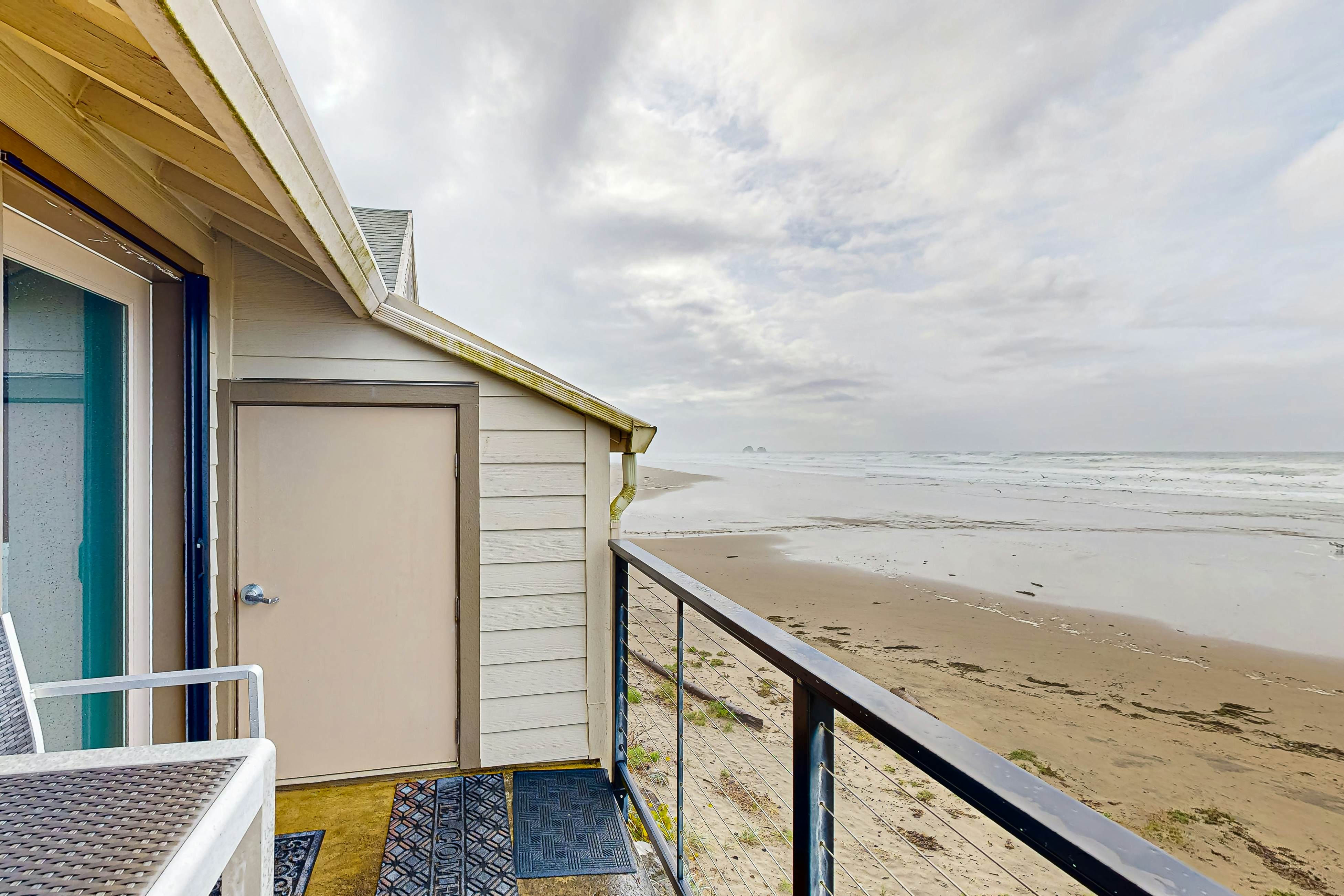 Rock Creek Inn condo on beach with ocean view balcony walk to shops and dining