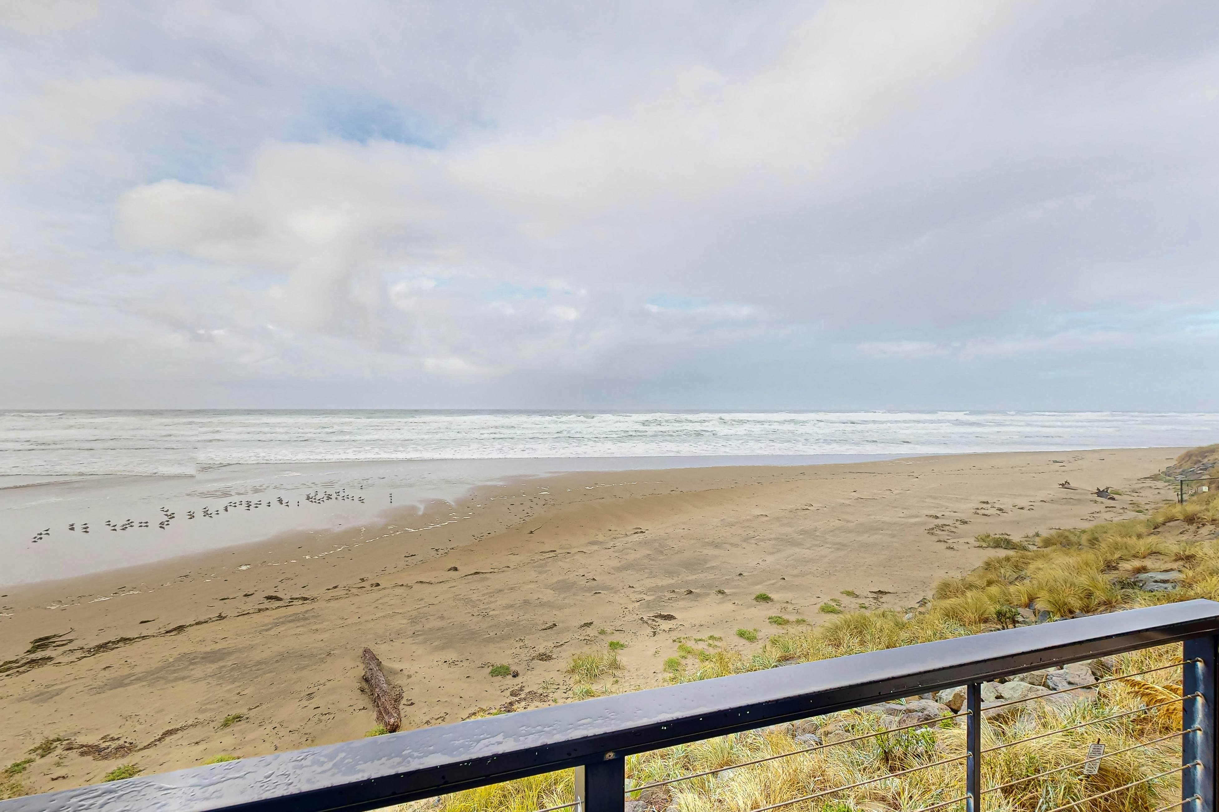 Rock Creek Inn condo on beach with ocean view balcony walk to shops and dining