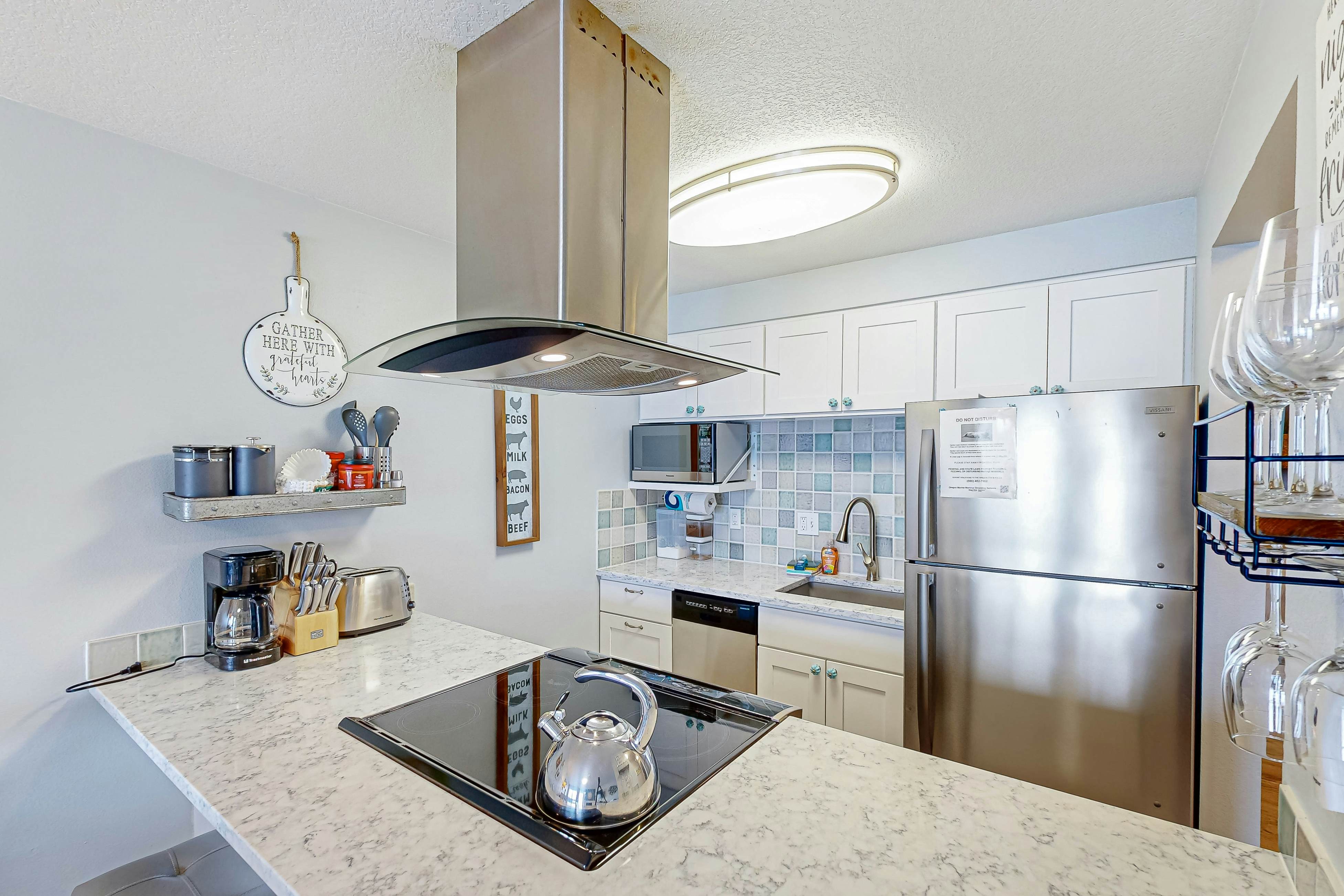 Rock Creek Inn condo on beach with ocean view balcony walk to shops and dining