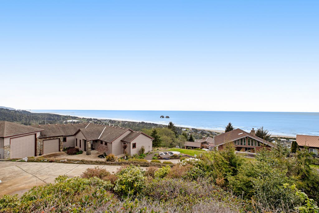 Ocean view home with a deck gas grill free WiFi and washer dryer