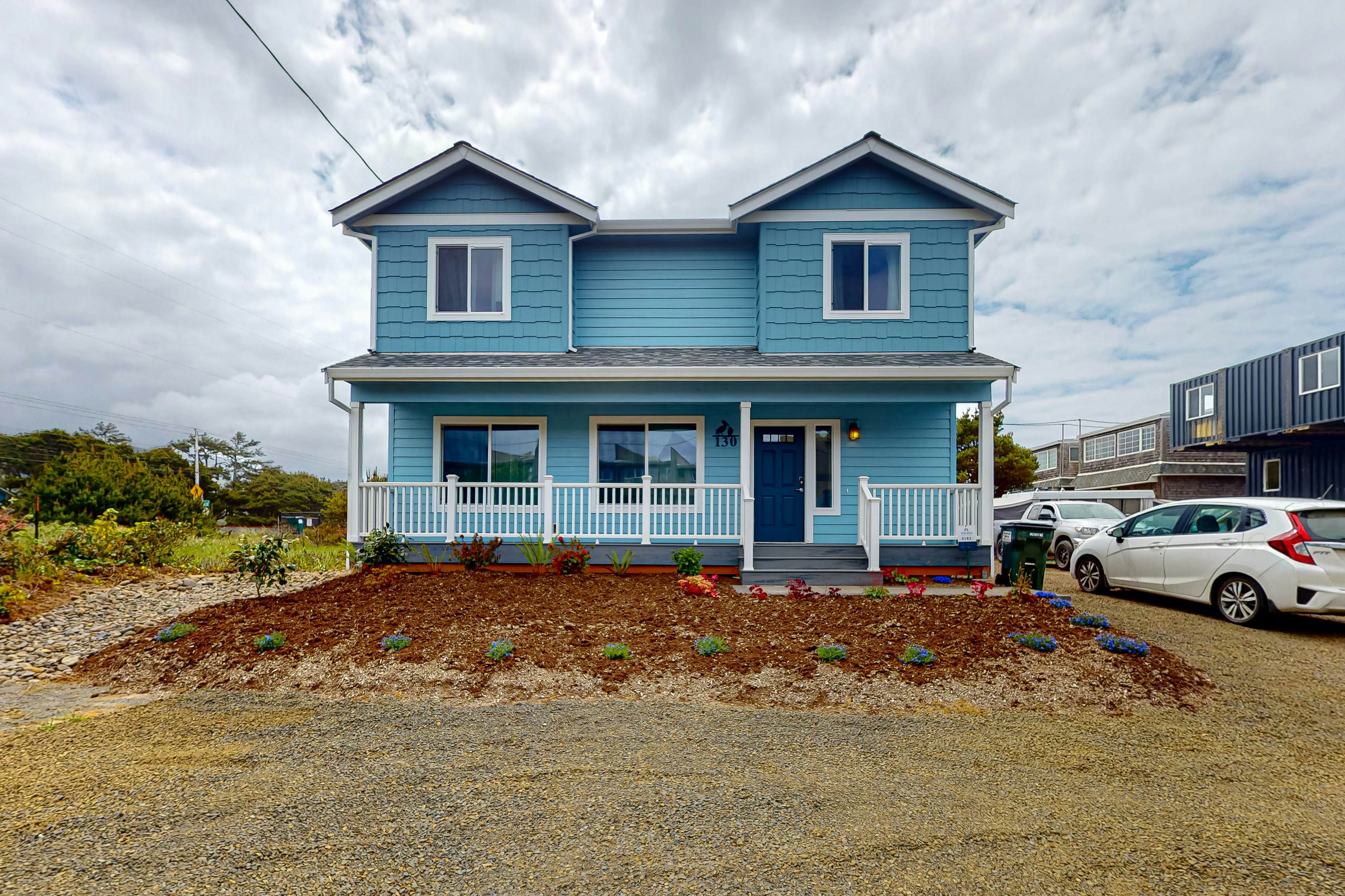 4BR home steps from the beach with private hot tub fireplace and firepit
