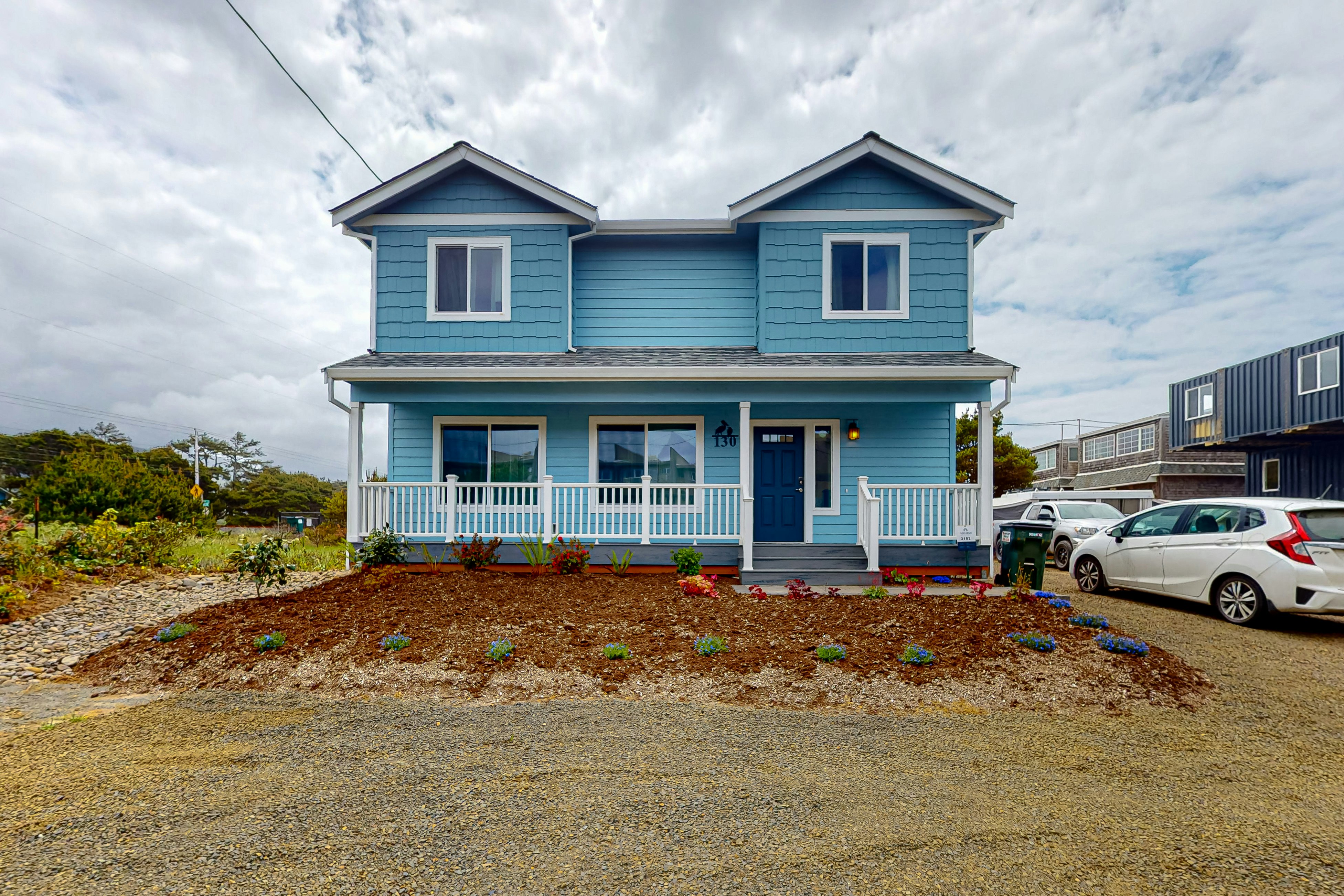 4BR  home steps from the beach with private hot tub, fireplace & firepit