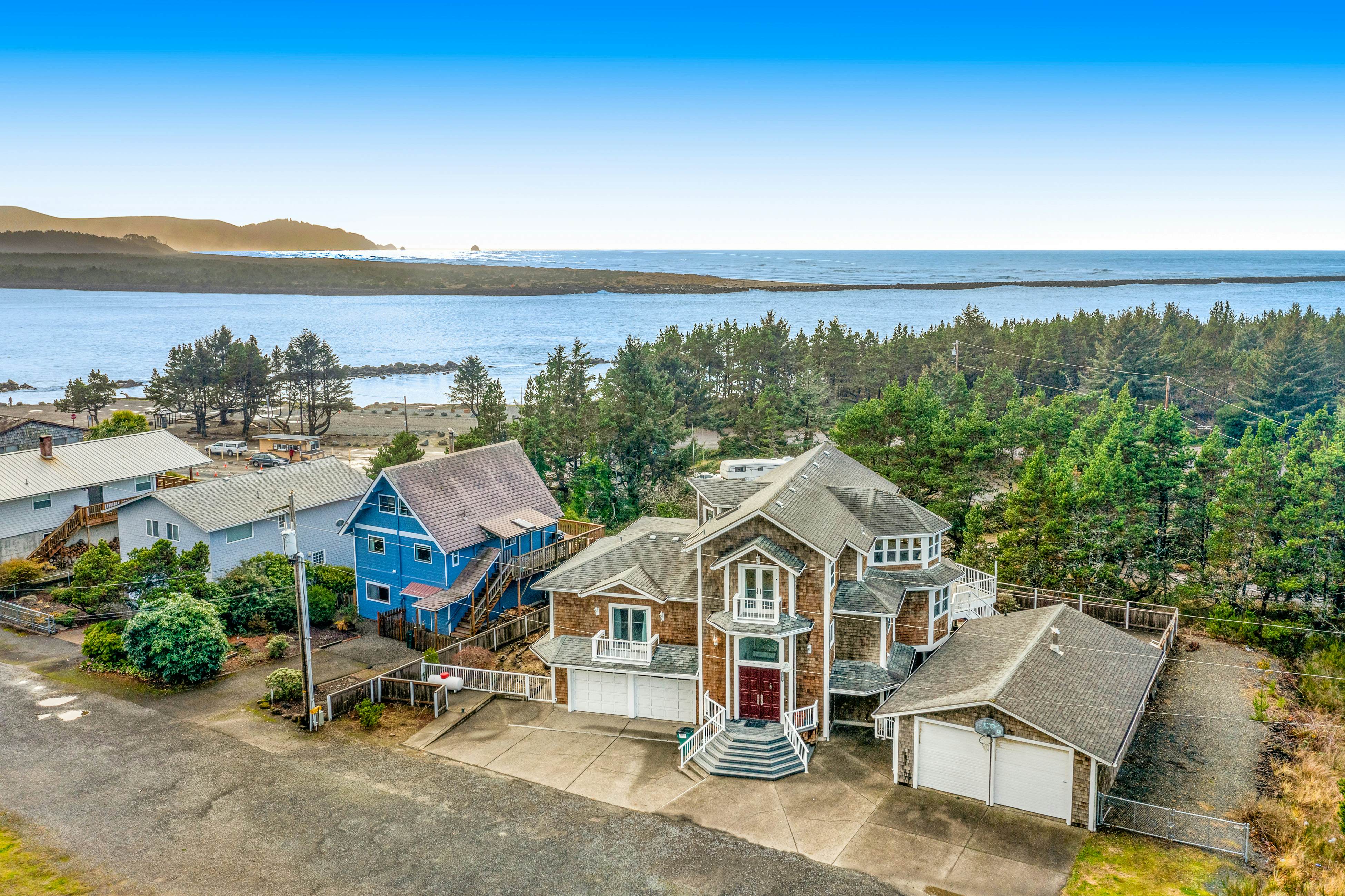 Coastal estate with private hot tub enclosed yard firepit and game room