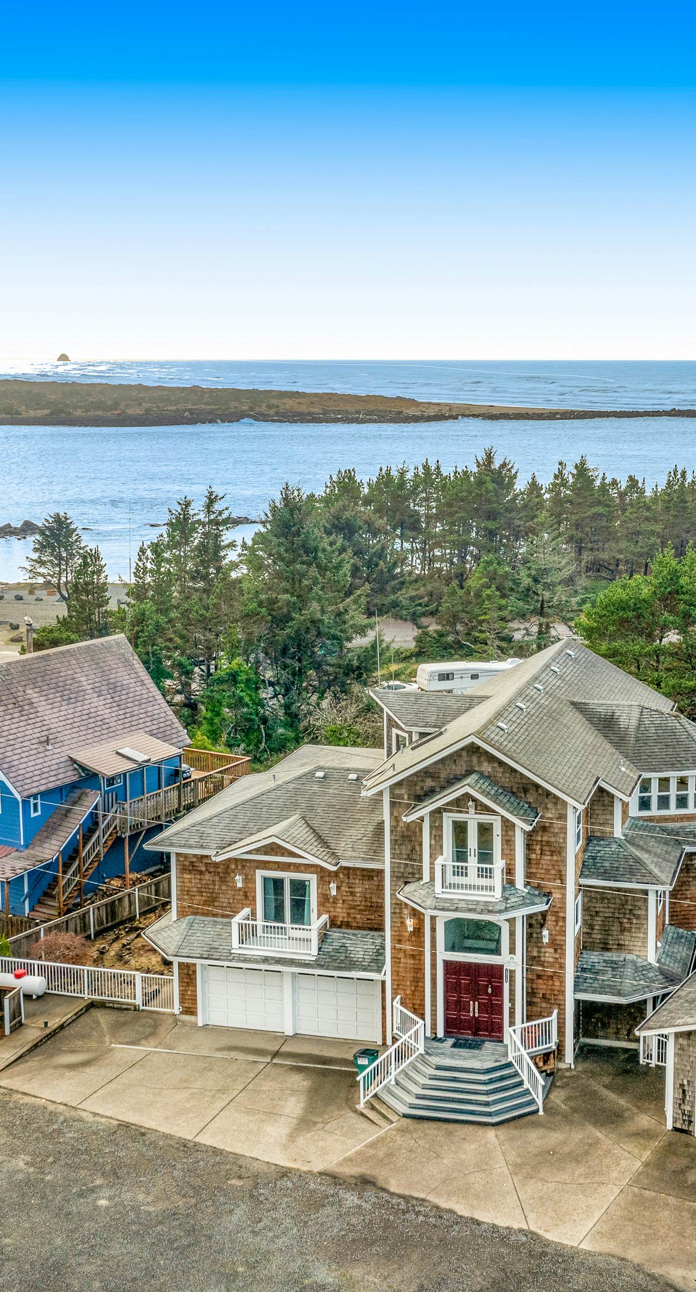 Coastal estate with private hot tub enclosed yard firepit and game room