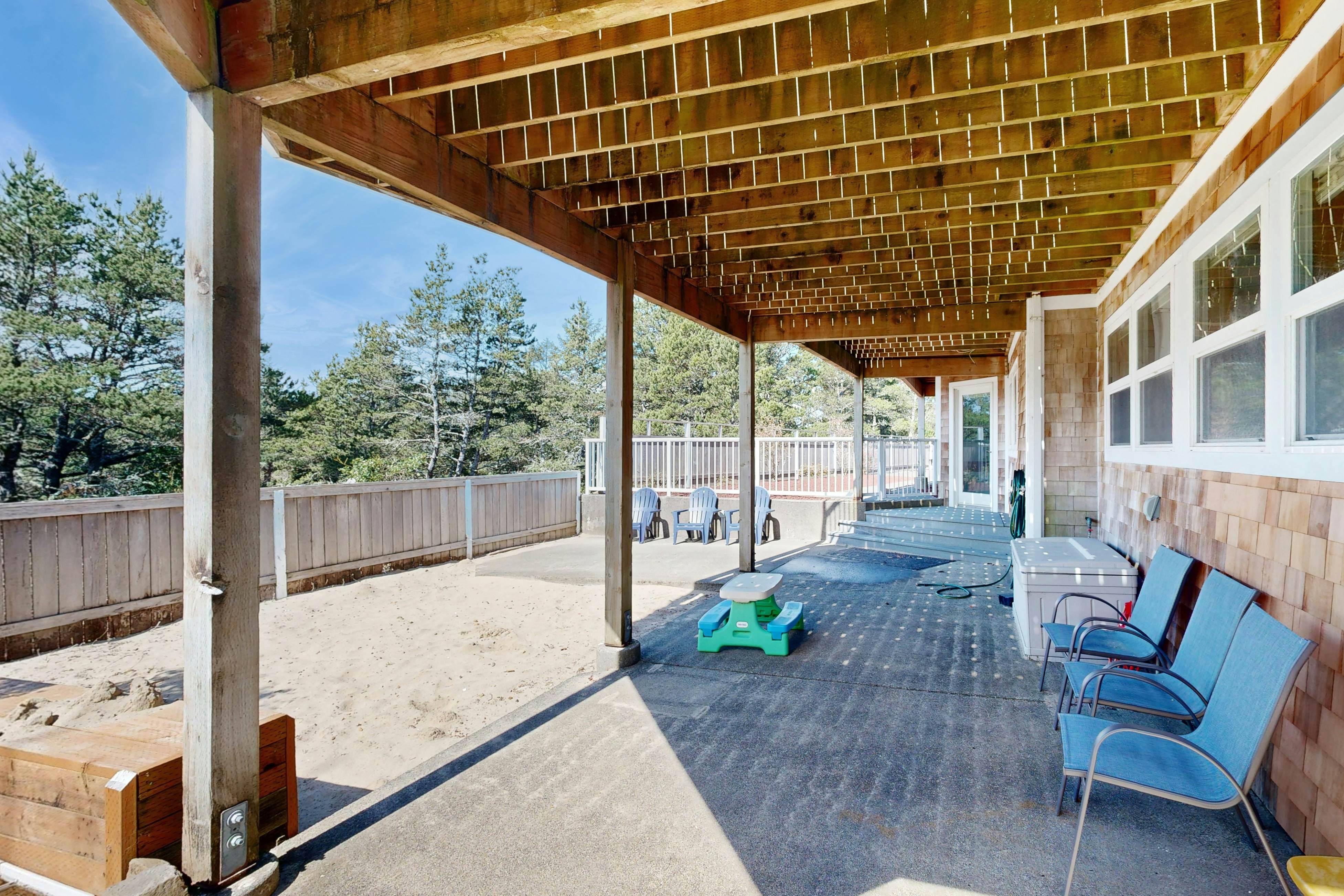 Coastal estate with private hot tub enclosed yard firepit and game room