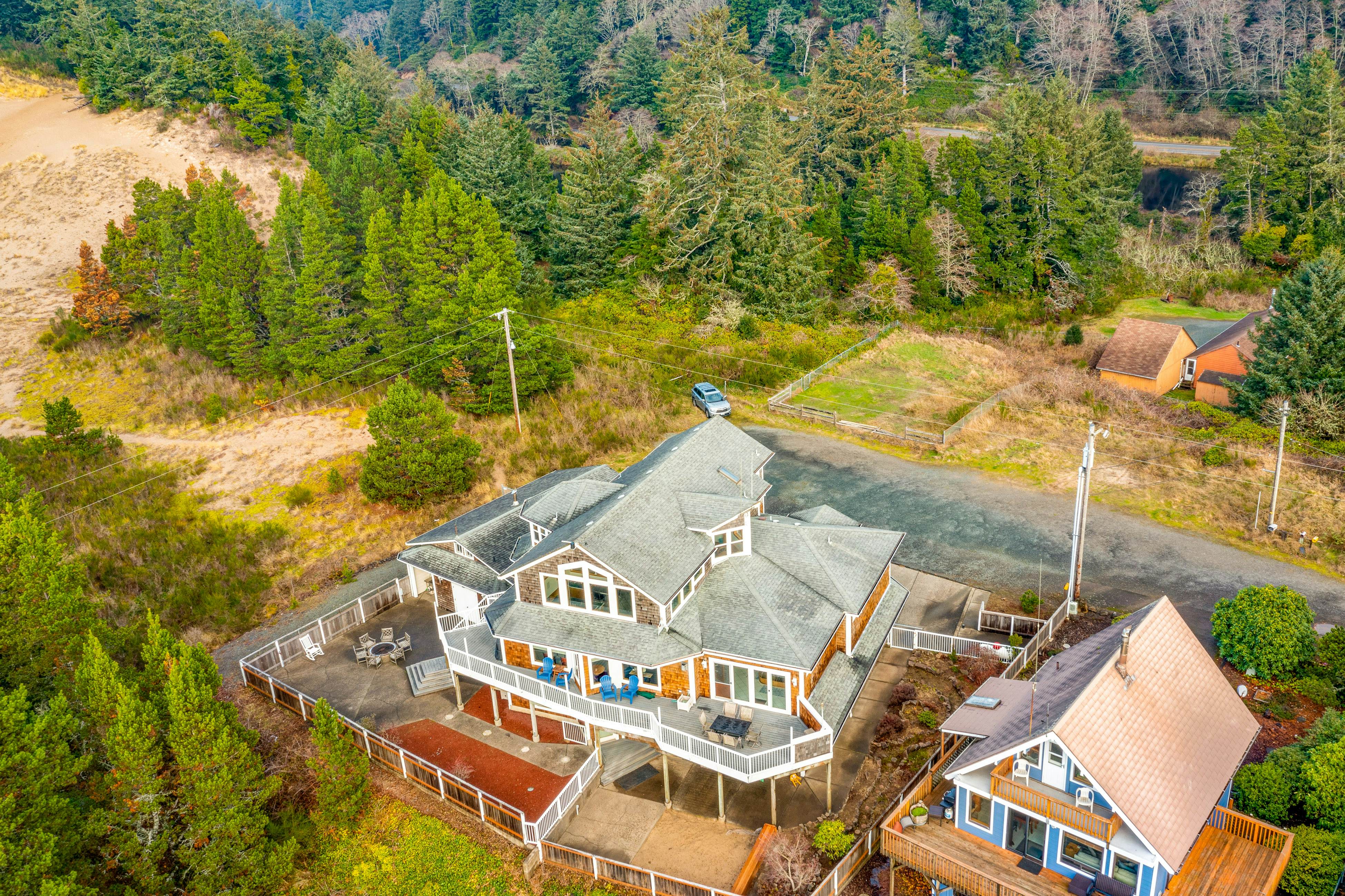 Coastal estate with private hot tub enclosed yard firepit and game room