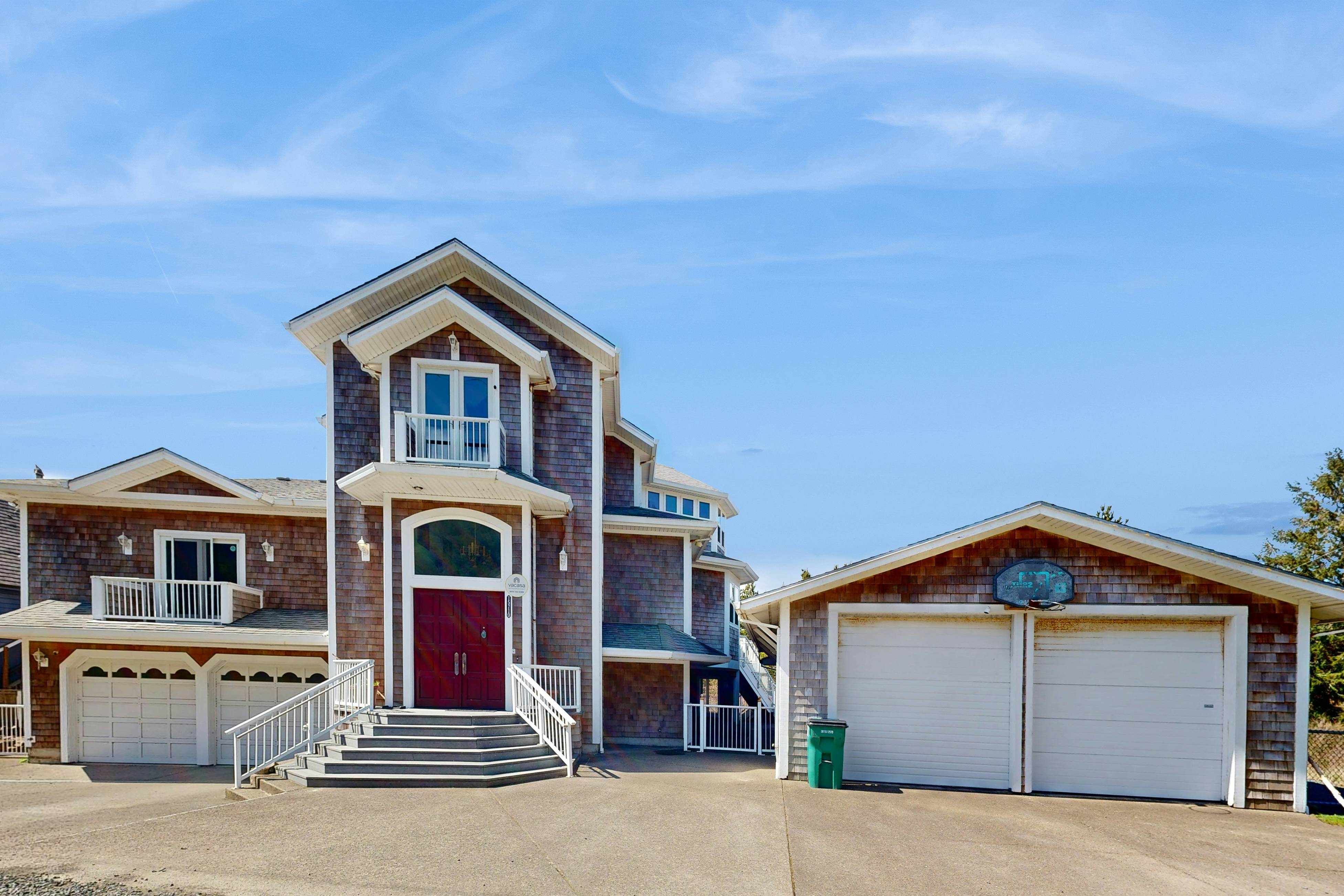 Coastal estate with private hot tub enclosed yard firepit and game room
