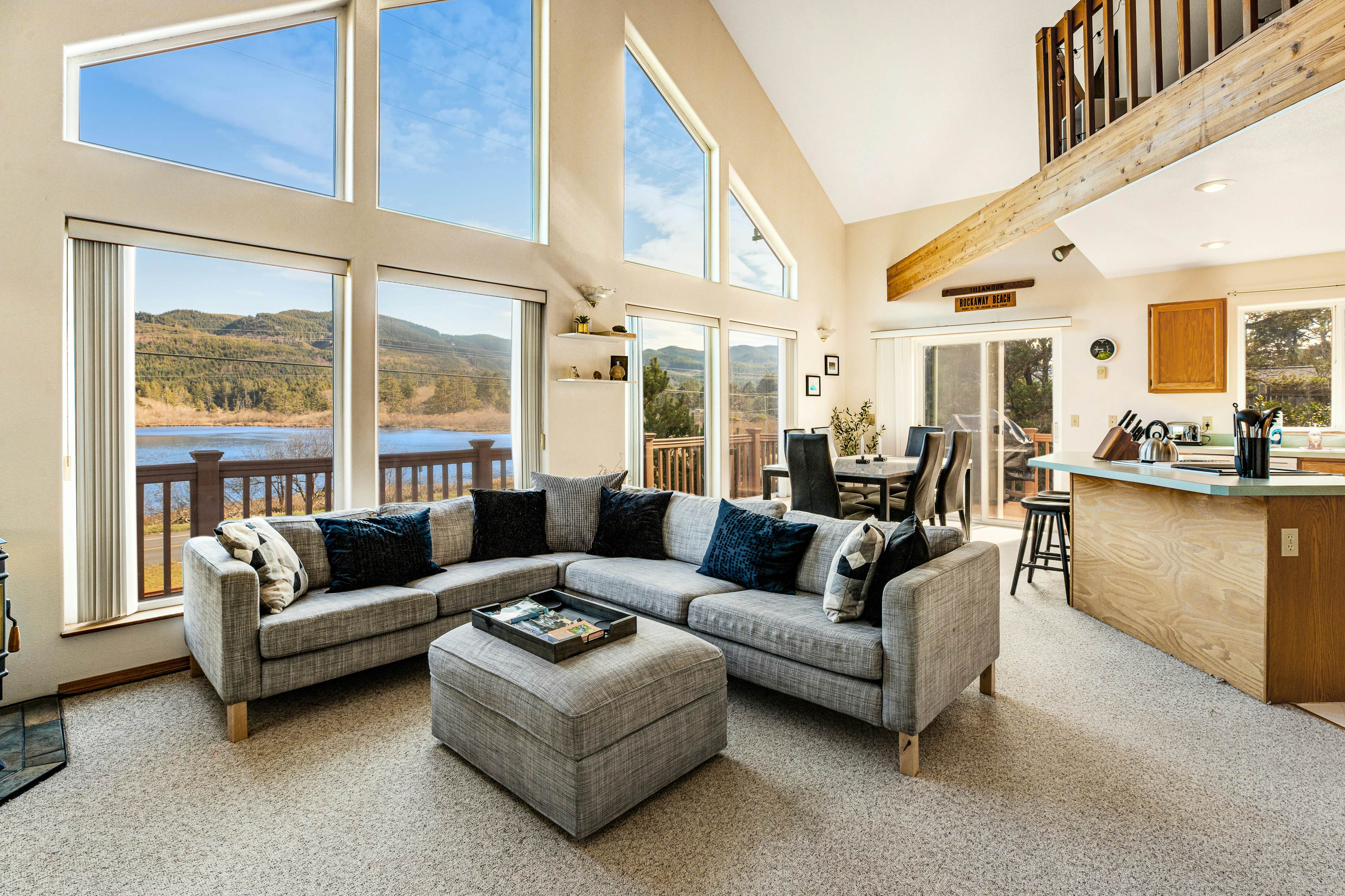 Lake view getaway steps from beach with WiFi and private washer dryer dogs ok