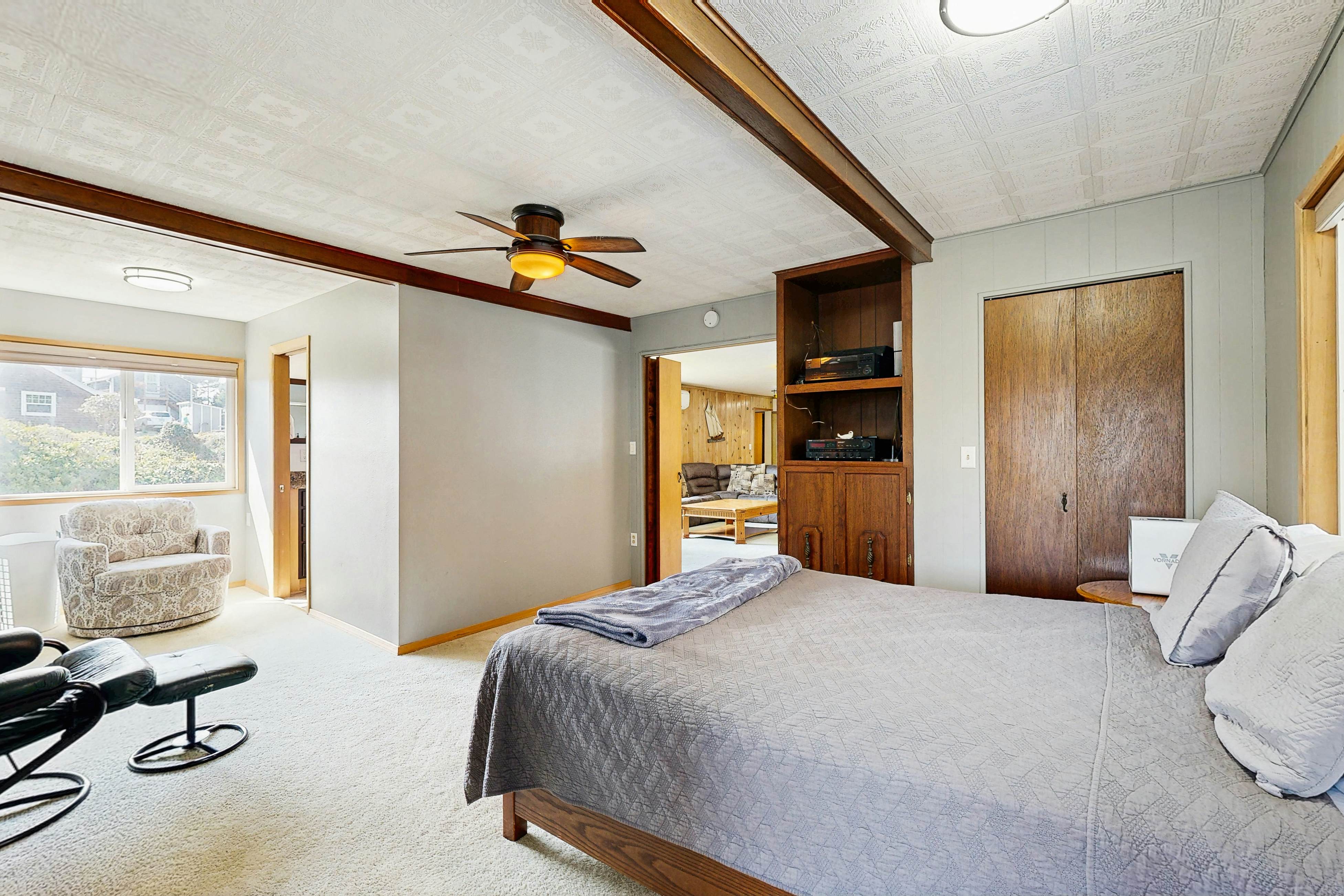 Centrally located home with lake views, private pool & spacious deck