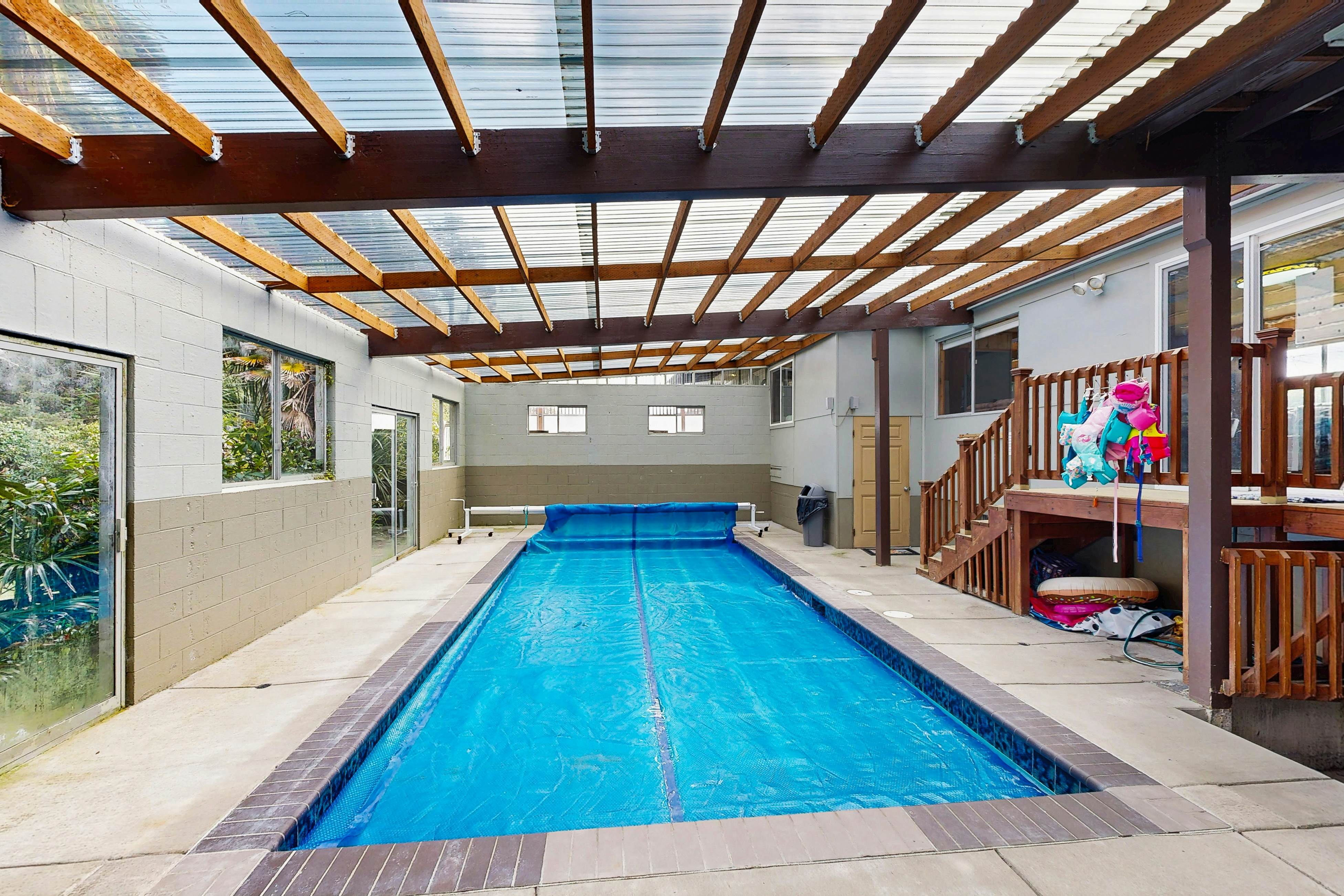 Centrally located home with lake views, private pool & spacious deck