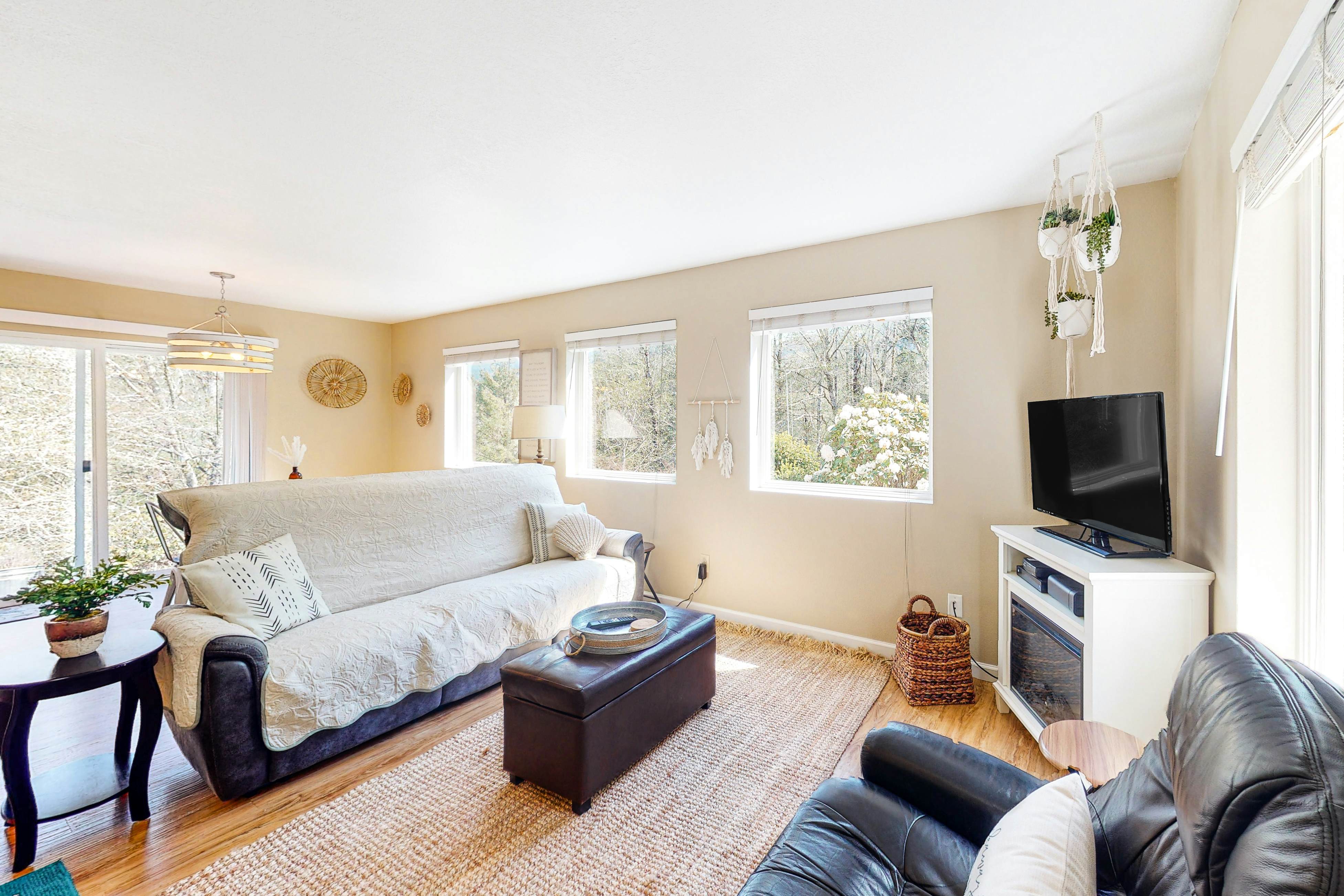 Dog Friendly Cottage Near Downtown with Firepit Private Hot Tub WiFi and Laundry