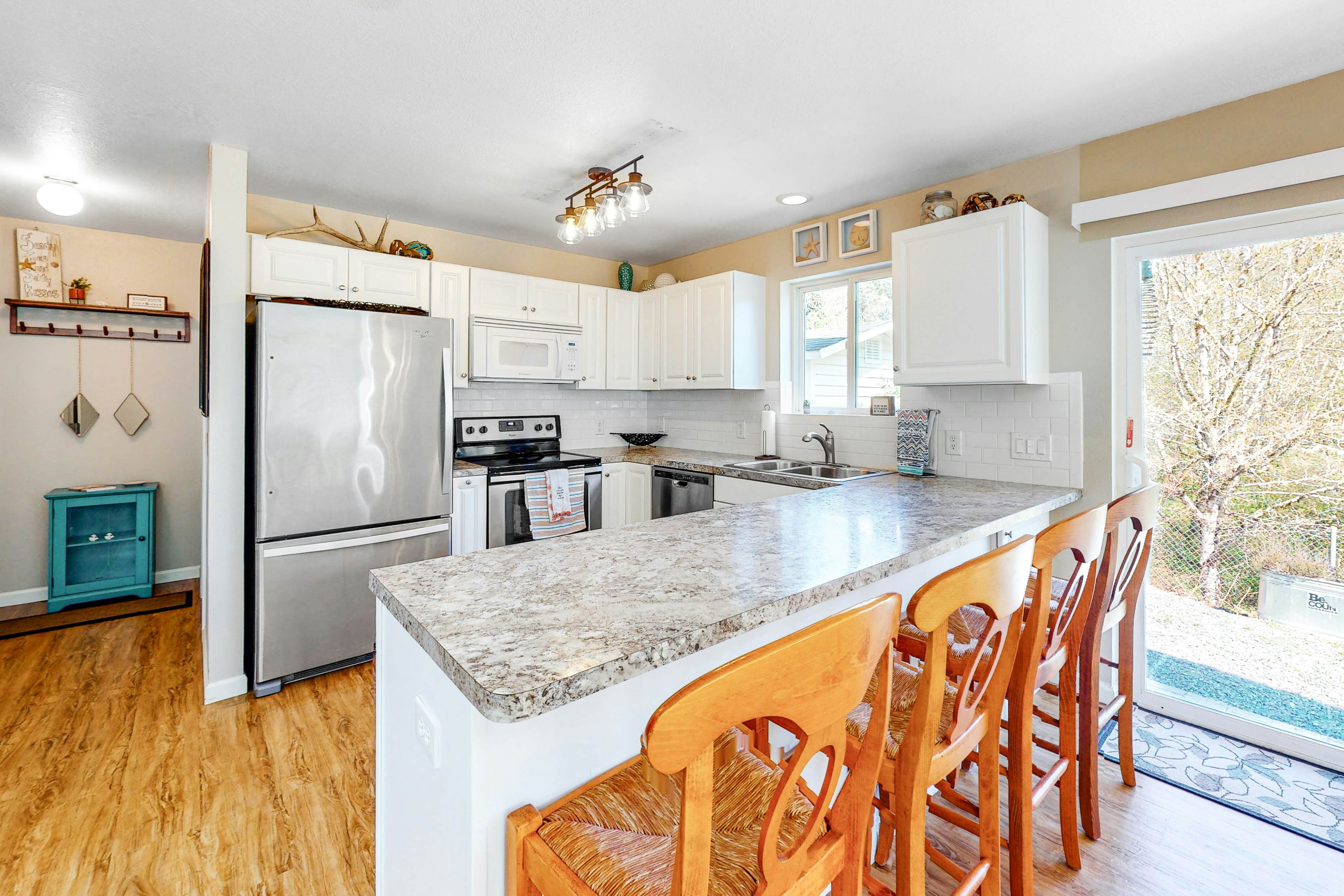 Dog Friendly Cottage Near Downtown with Firepit Private Hot Tub WiFi and Laundry