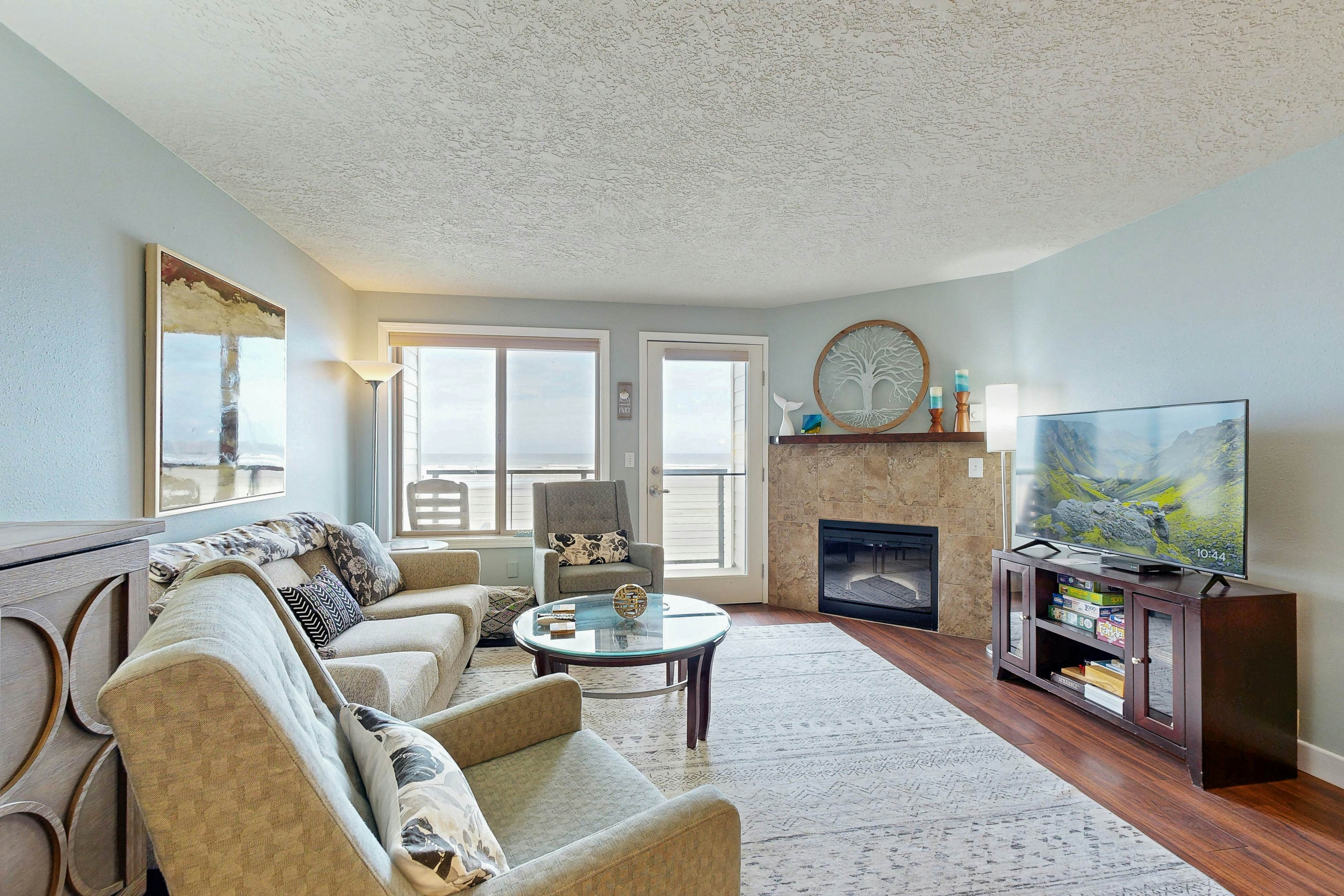 Beachfront condo boasting beautiful views a private balcony and perfect location