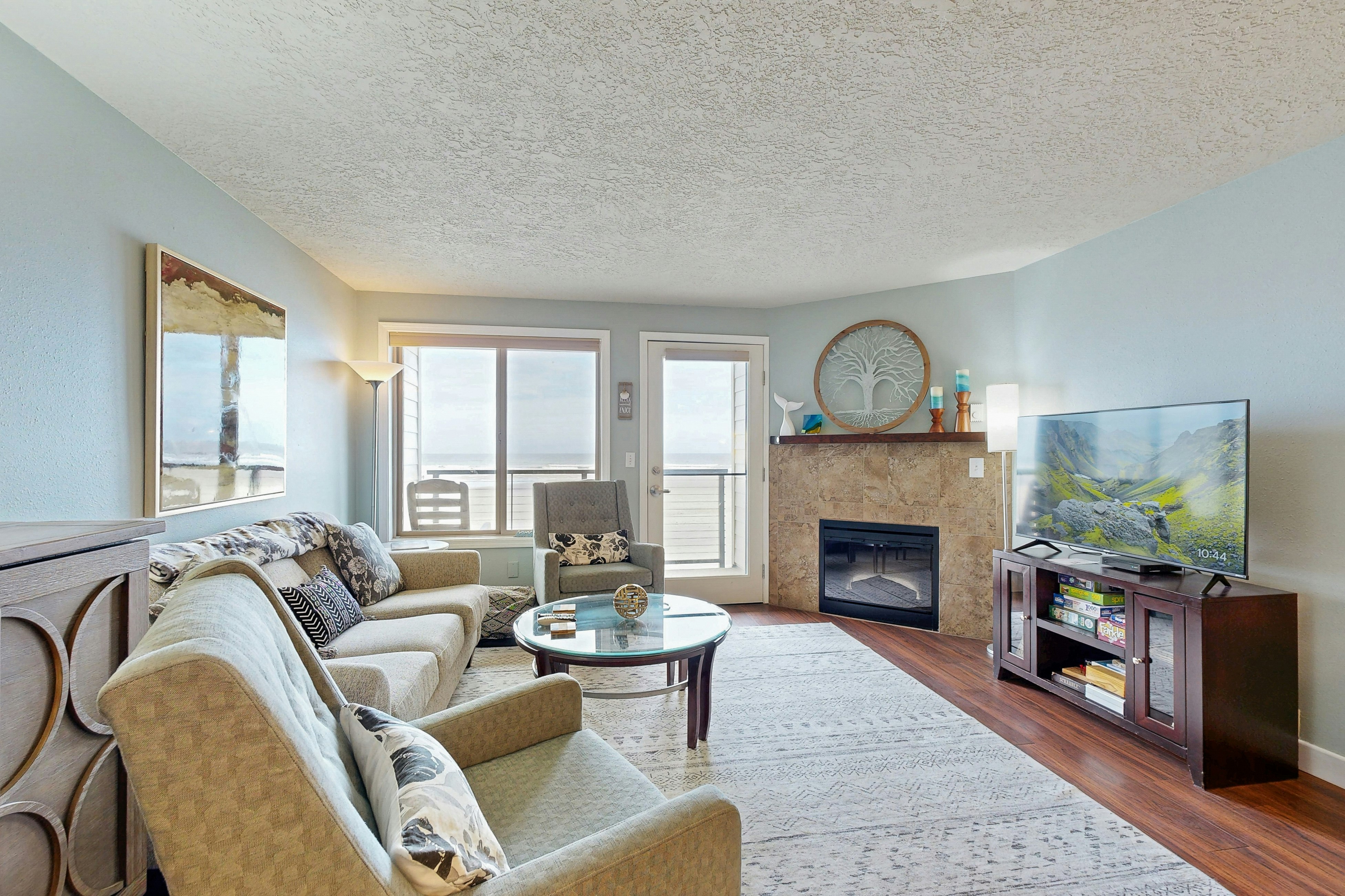 Beachfront condo boasting beautiful views, a private balcony & perfect location