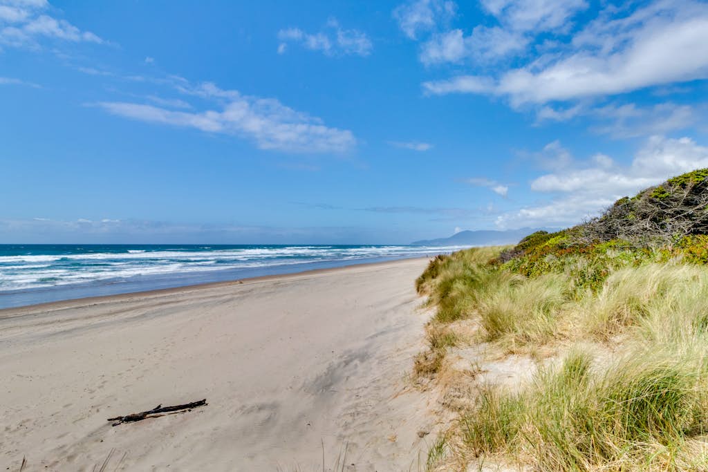 Beachfront condo boasting beautiful views a private balcony and perfect location