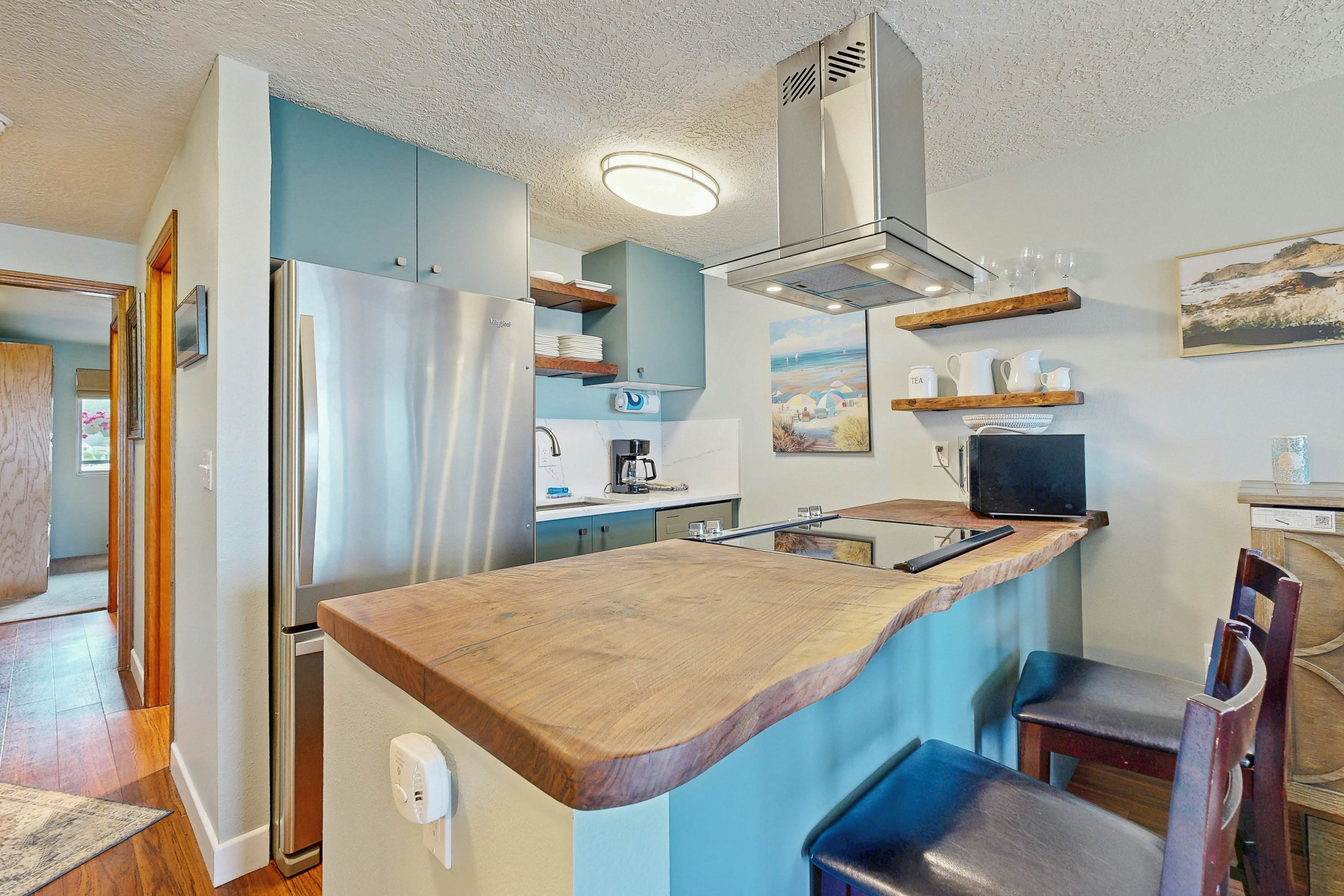 Beachfront condo boasting beautiful views a private balcony and perfect location