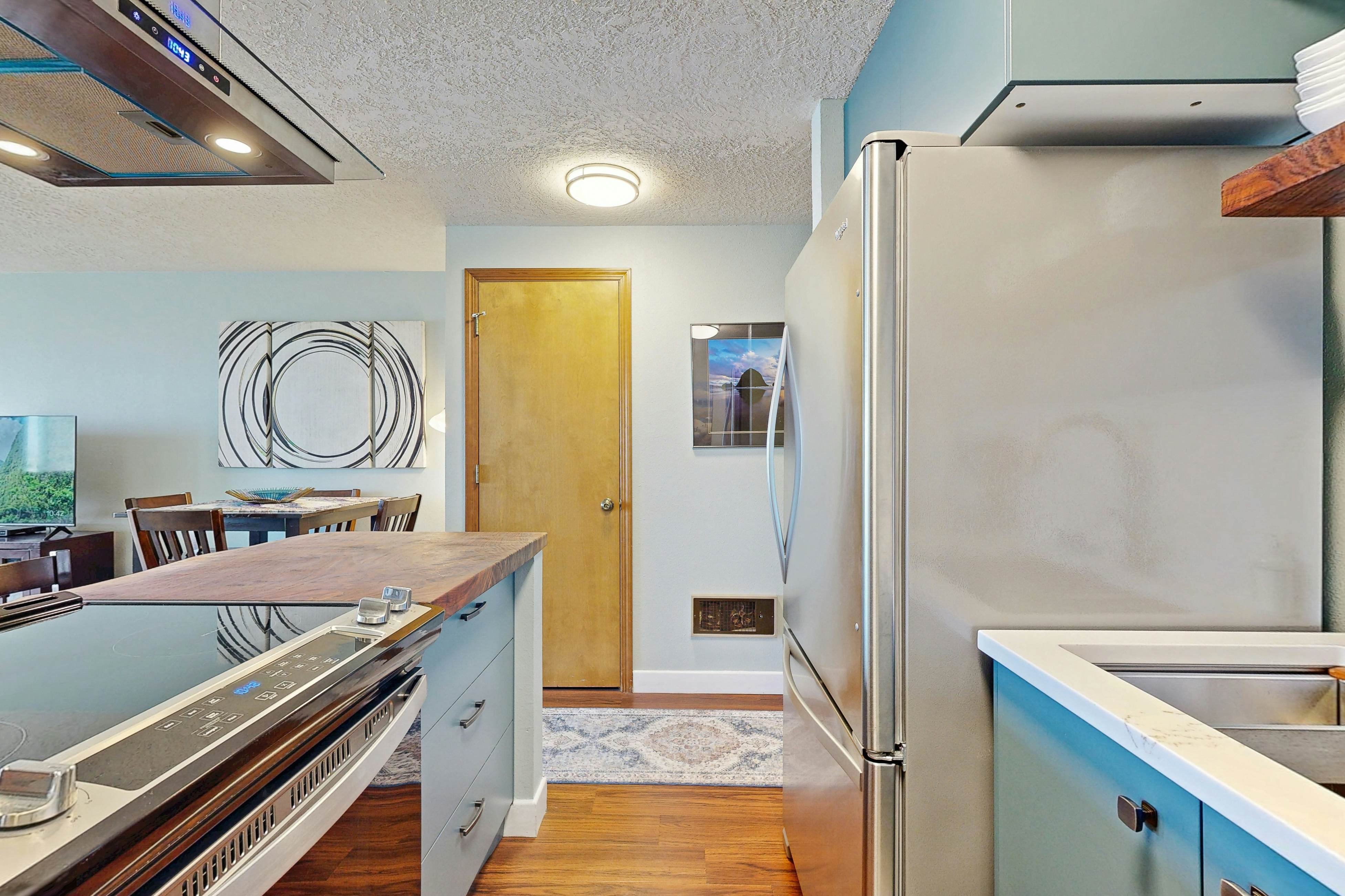 Beachfront condo boasting beautiful views a private balcony and perfect location