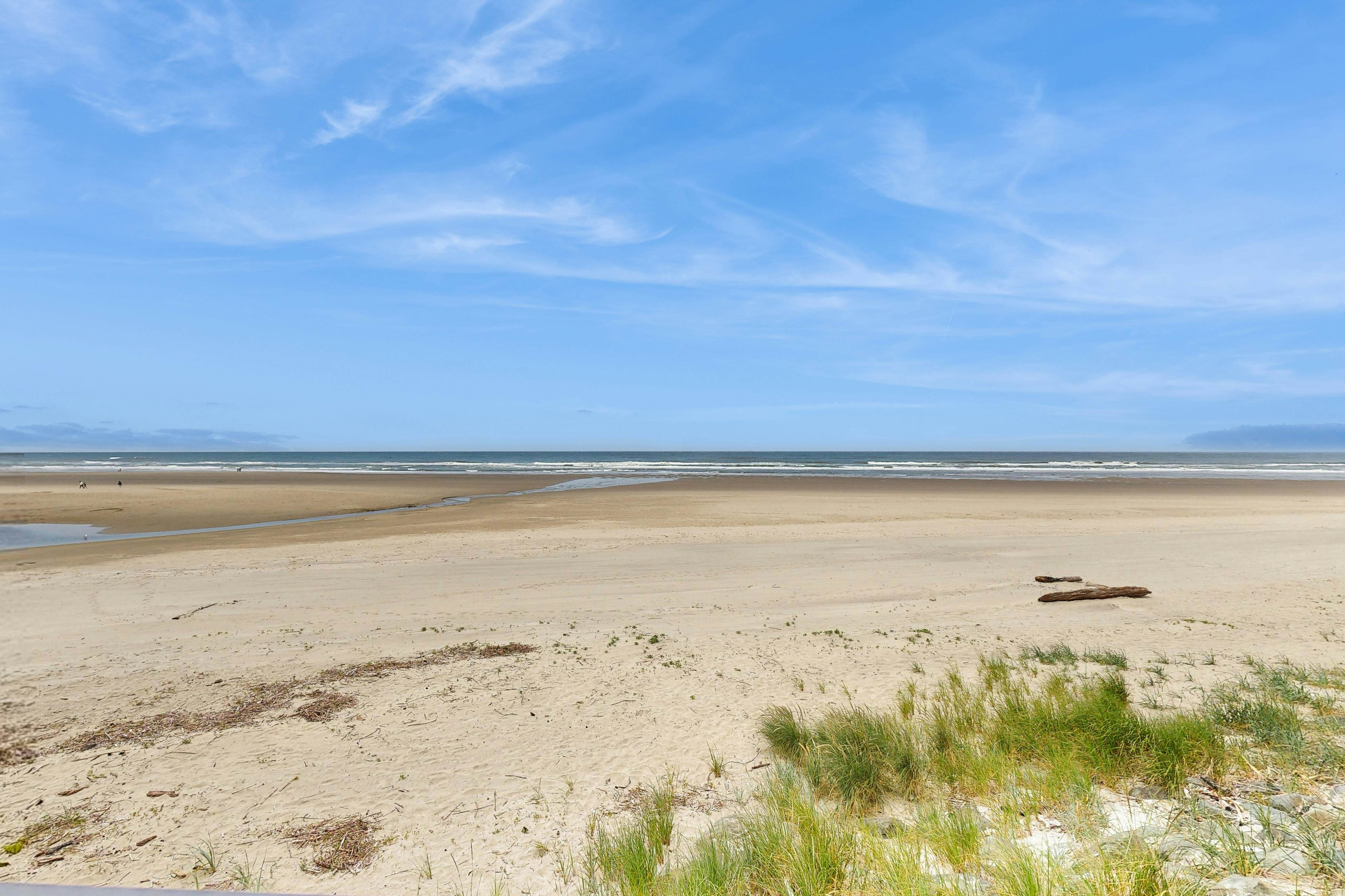 Beachfront condo boasting beautiful views a private balcony and perfect location