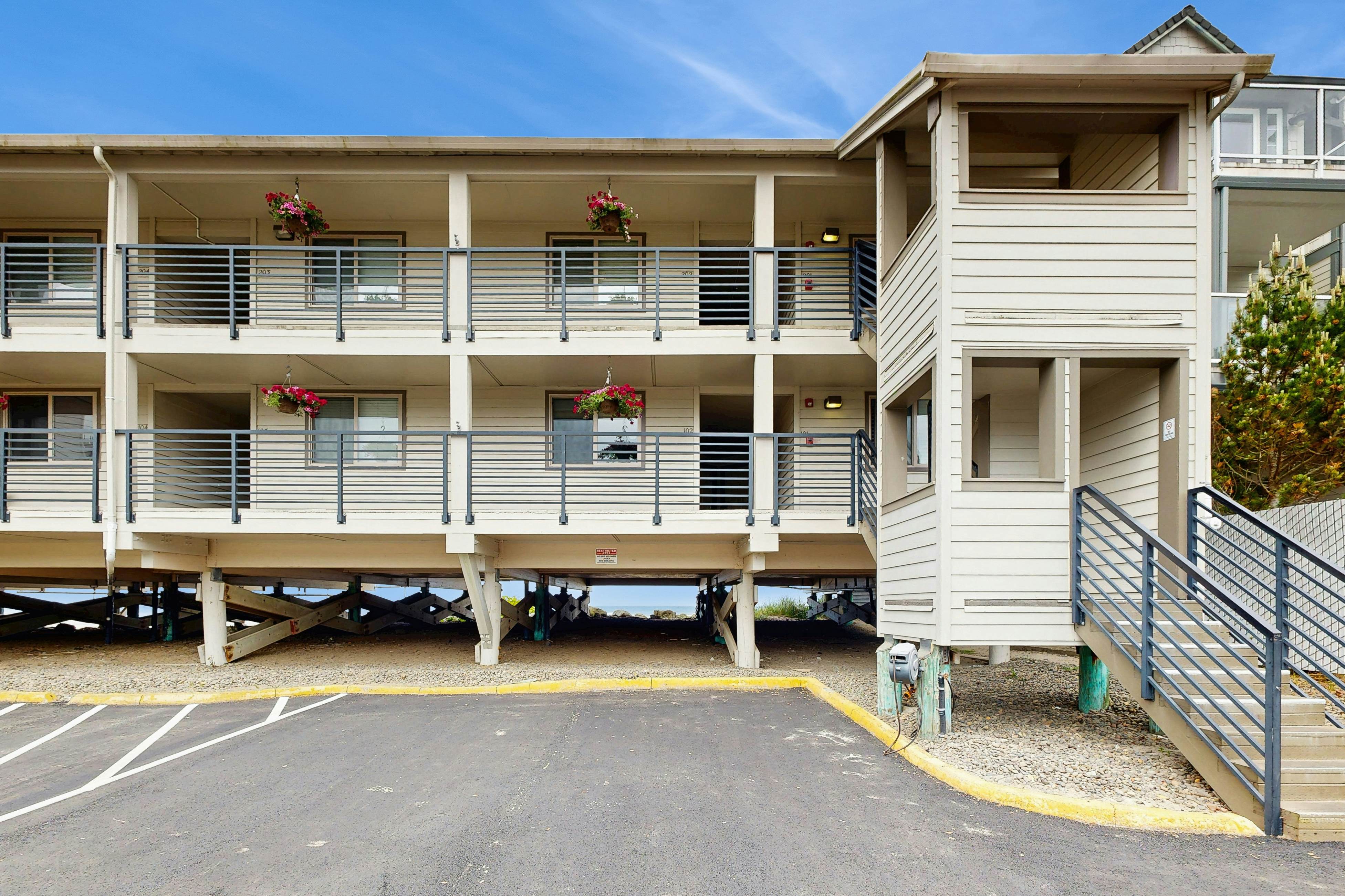 Beachfront condo boasting beautiful views a private balcony and perfect location