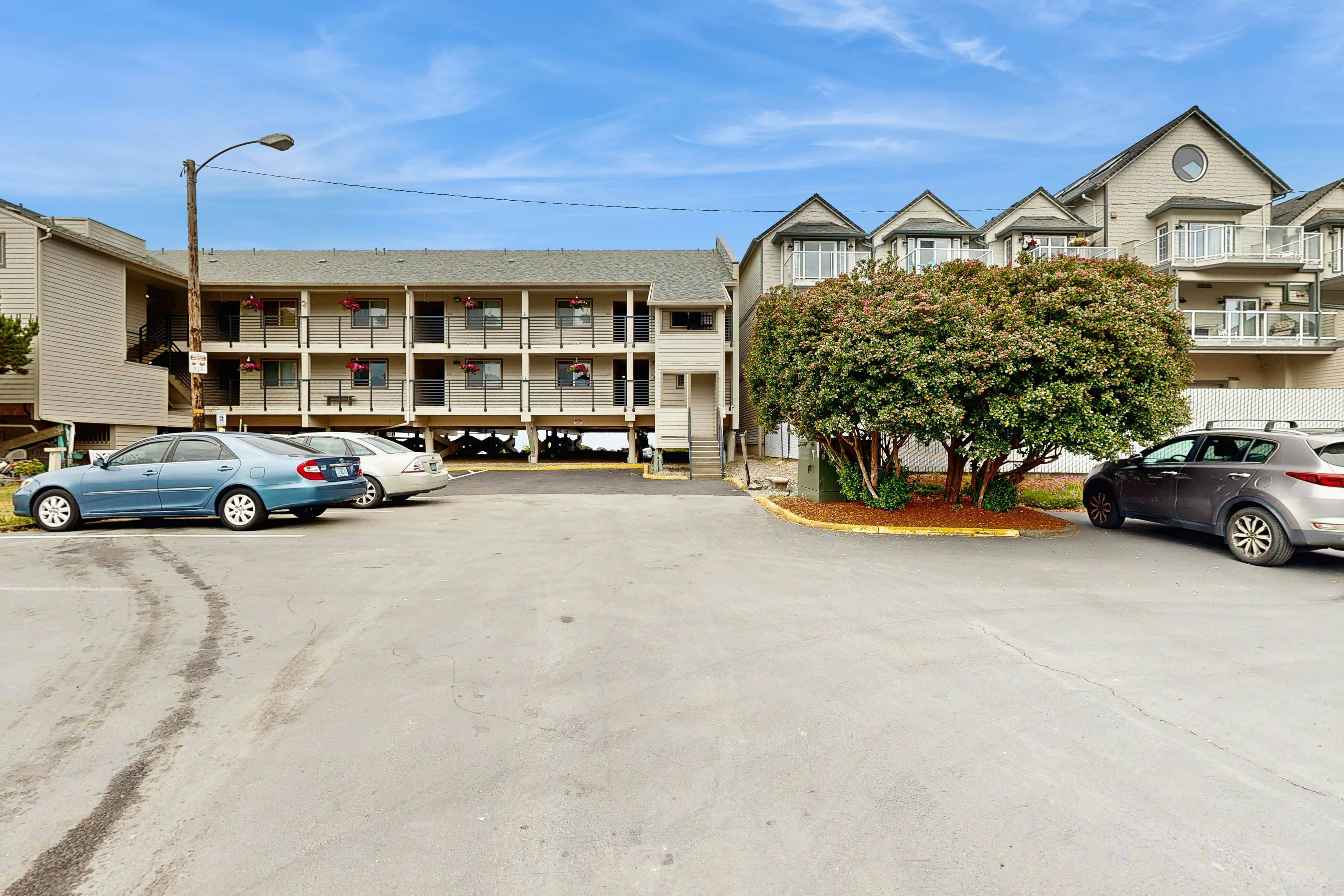 Beachfront condo boasting beautiful views a private balcony and perfect location