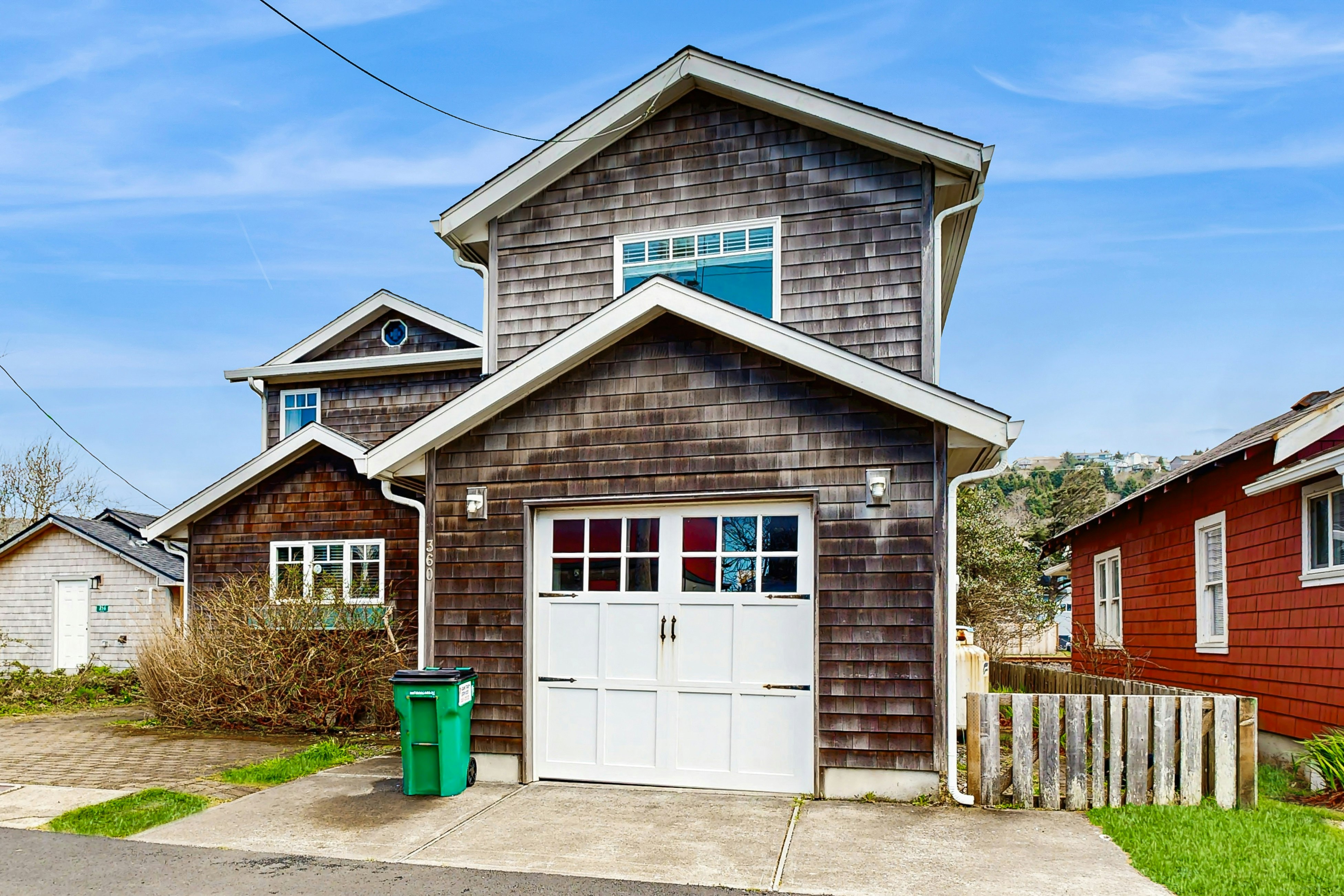 Dog-friendly beach home with firepit, private hot tub, beach access & arcade