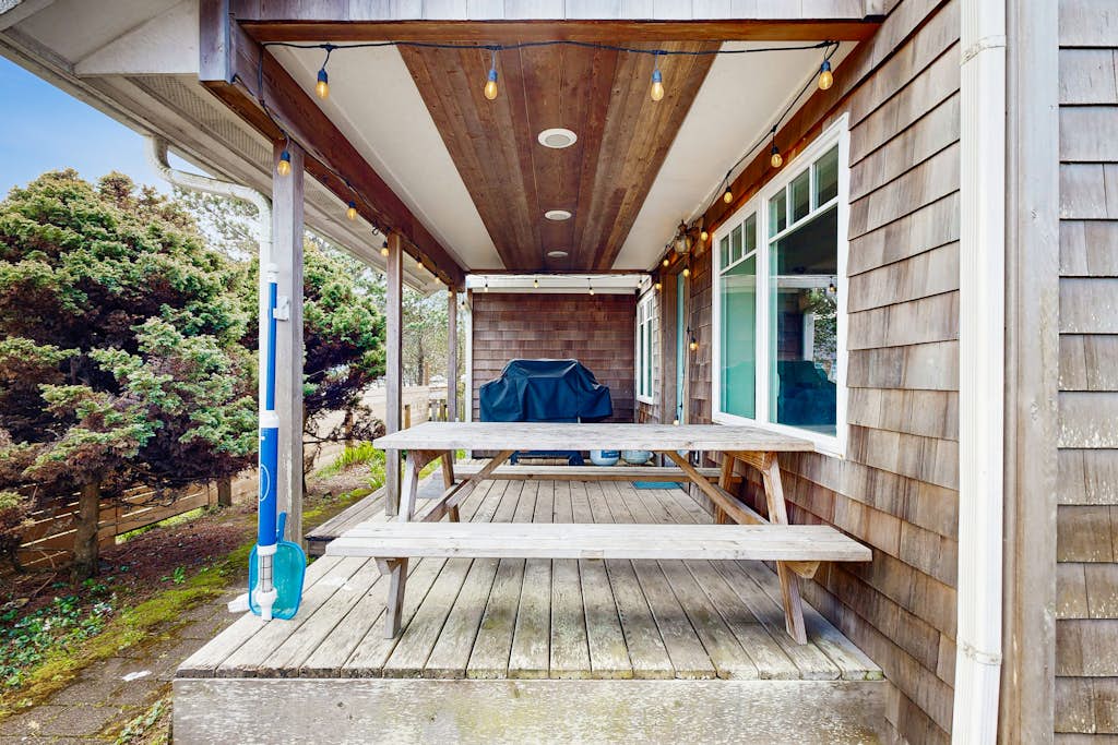 Dog friendly beach home with firepit private hot tub beach access and arcade