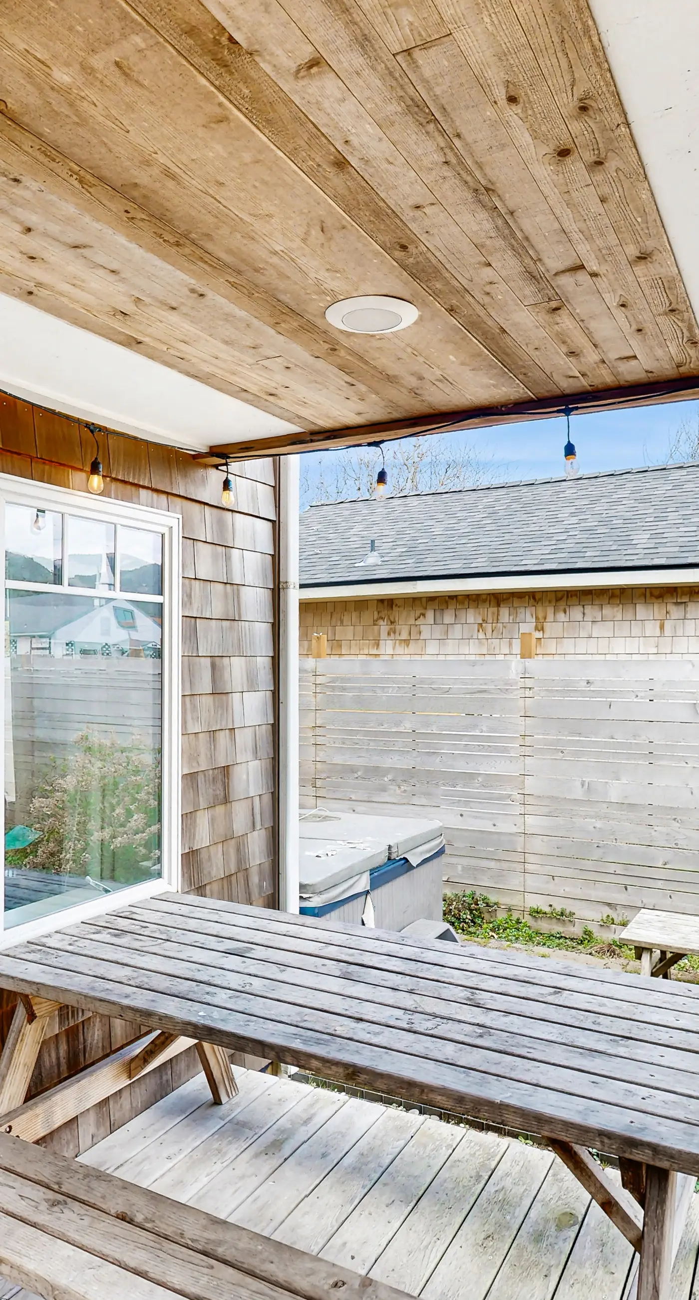 Dog friendly beach home with firepit private hot tub beach access and arcade