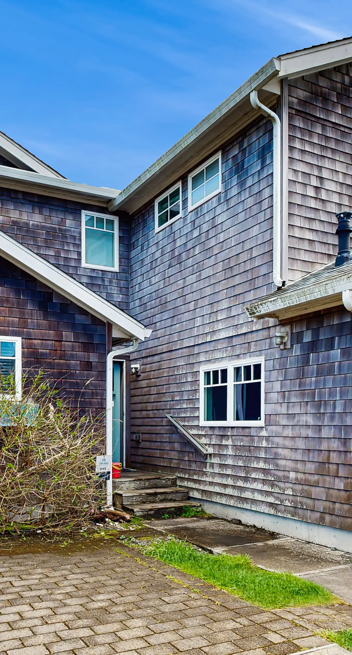 Dog friendly beach home with firepit private hot tub beach access and arcade