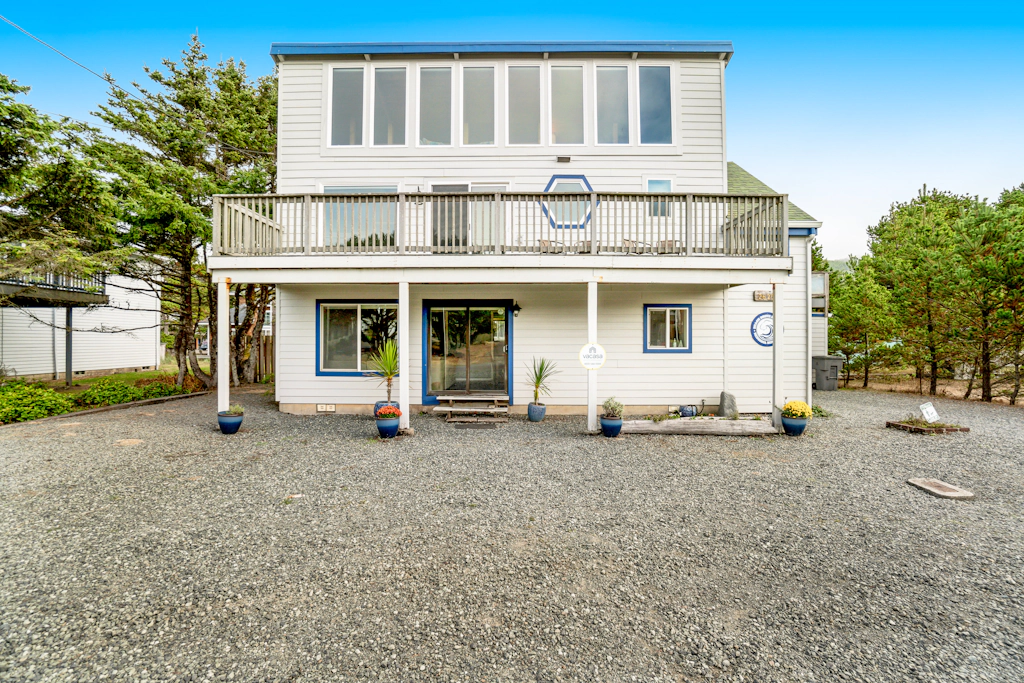 Dog friendly home across street from beach with rooftop deck and views