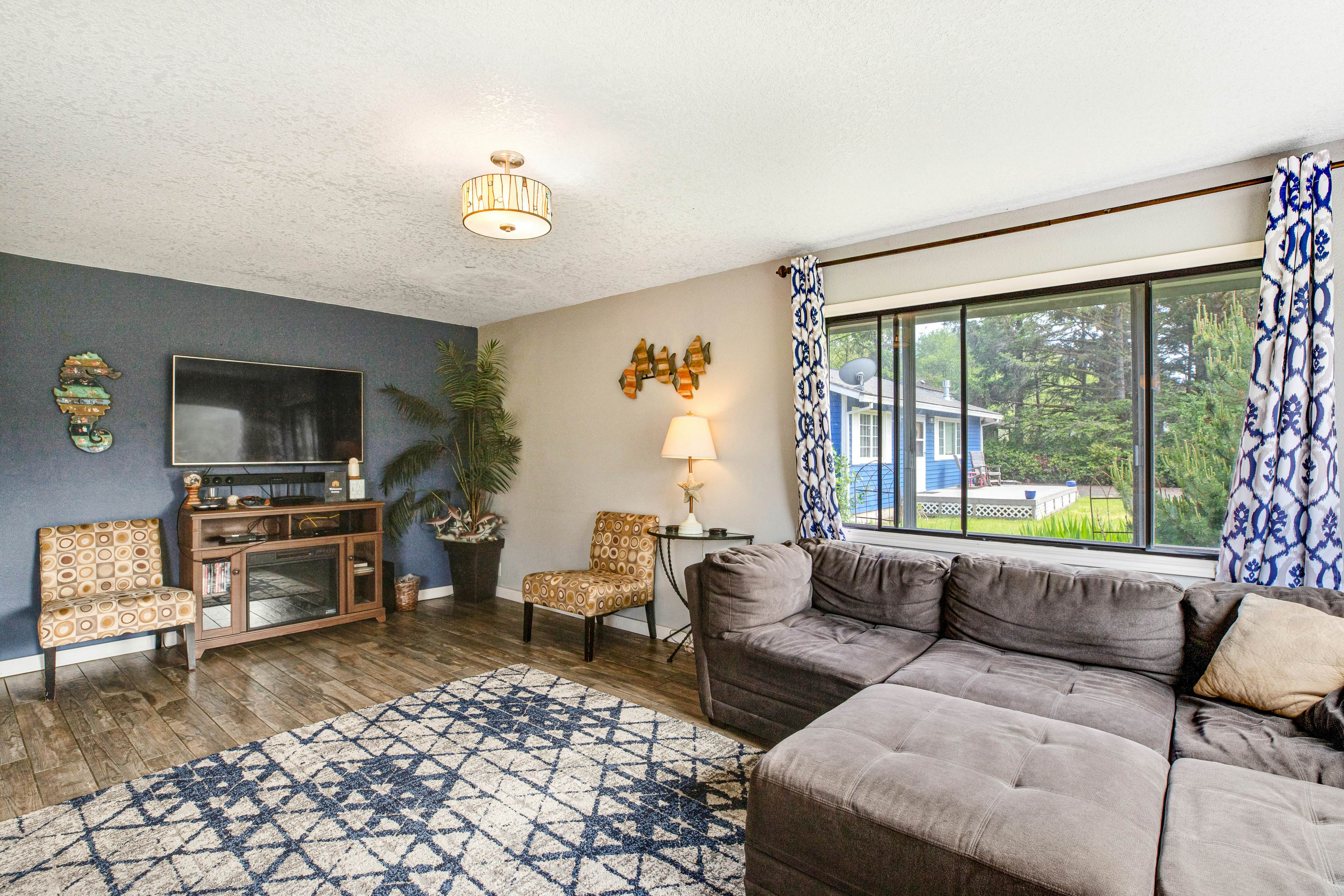 Dog-Friendly Home with Private Hot Tub & Game Room - Near the Beach & Nedonna Lake