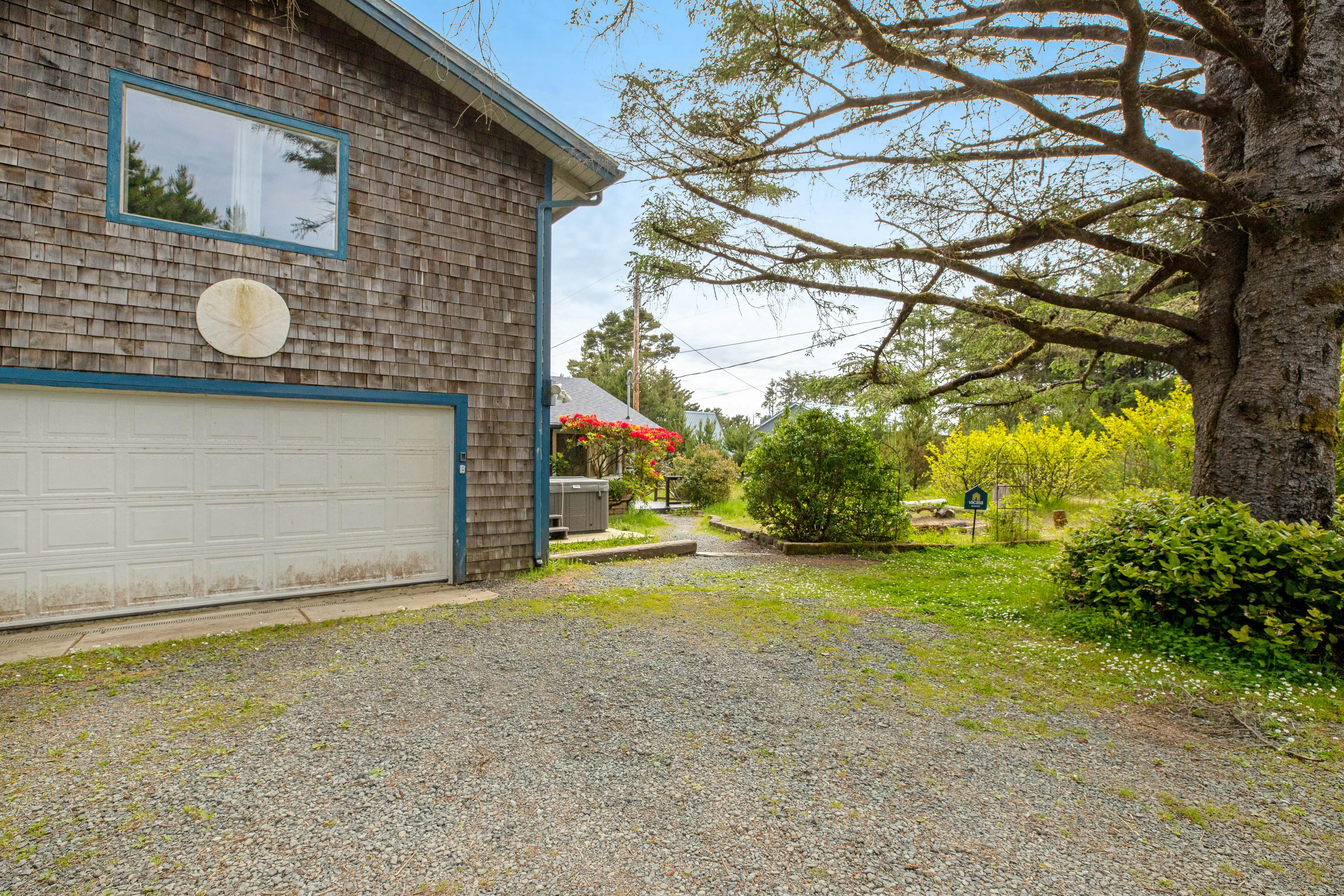 Dog-Friendly Home with Private Hot Tub & Game Room - Near the Beach & Nedonna Lake