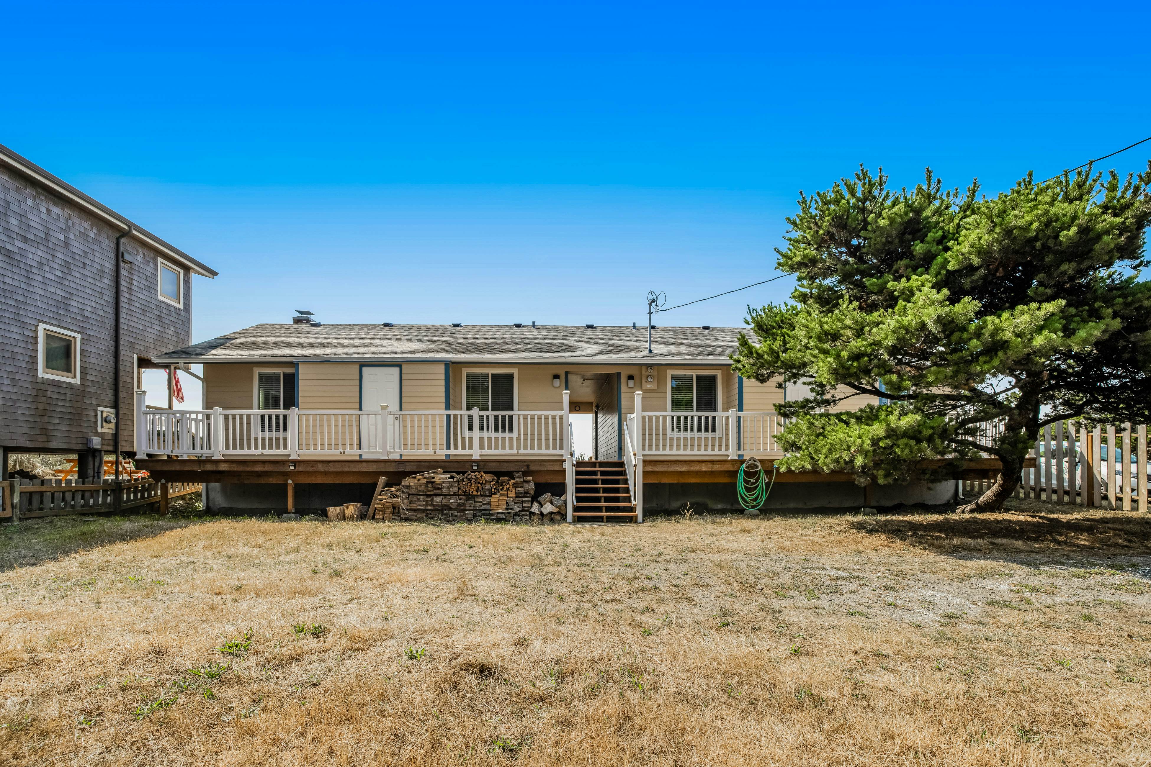 Entire oceanfront duplex with ocean view, expansive deck & beach access