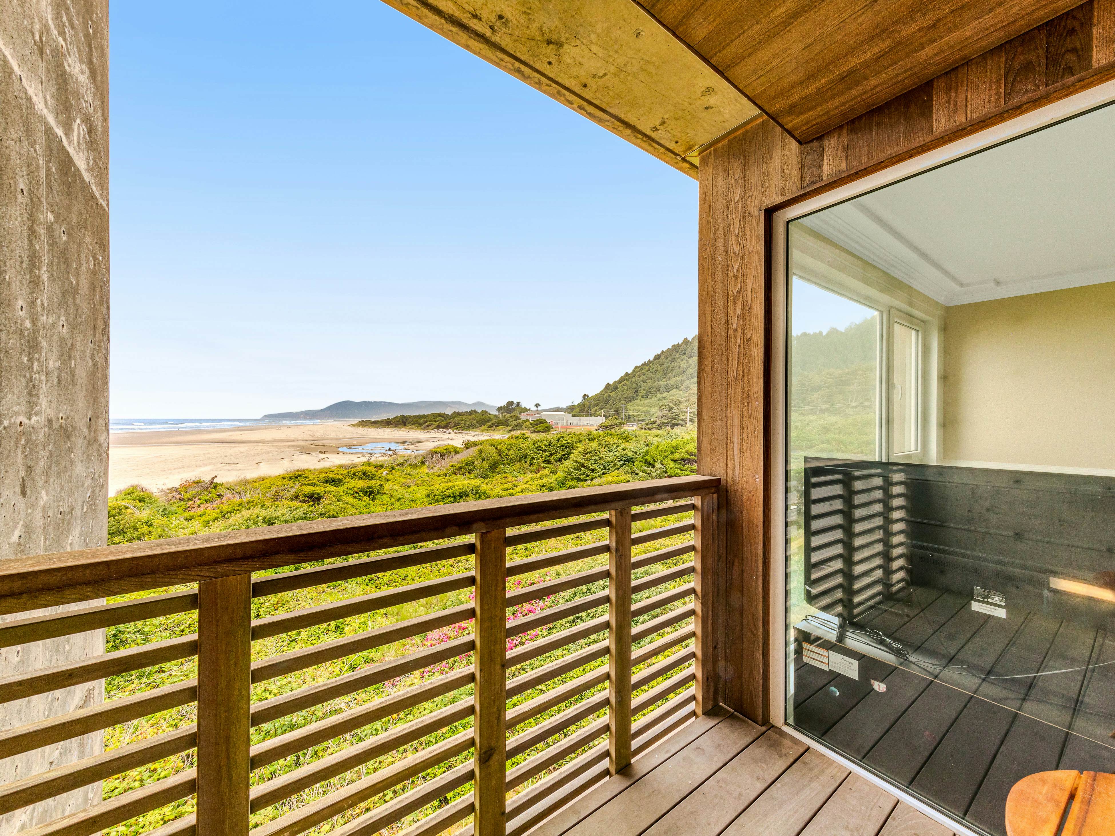 Elegant, oceanfront condo with deck & extraordinary views - dog-friendly