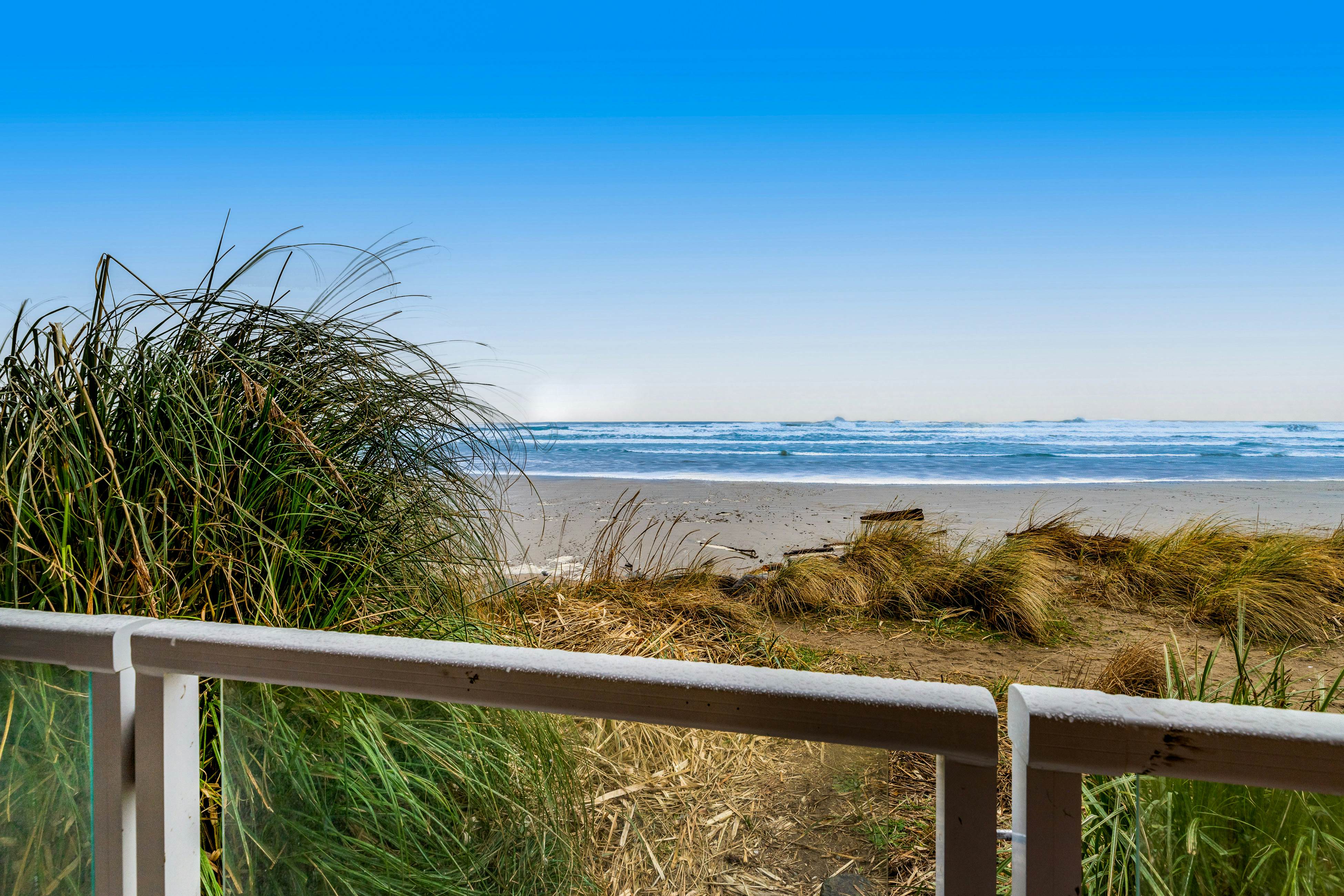 Oceanfront townhome with amazing views, decks, beach access, & updated kitchen