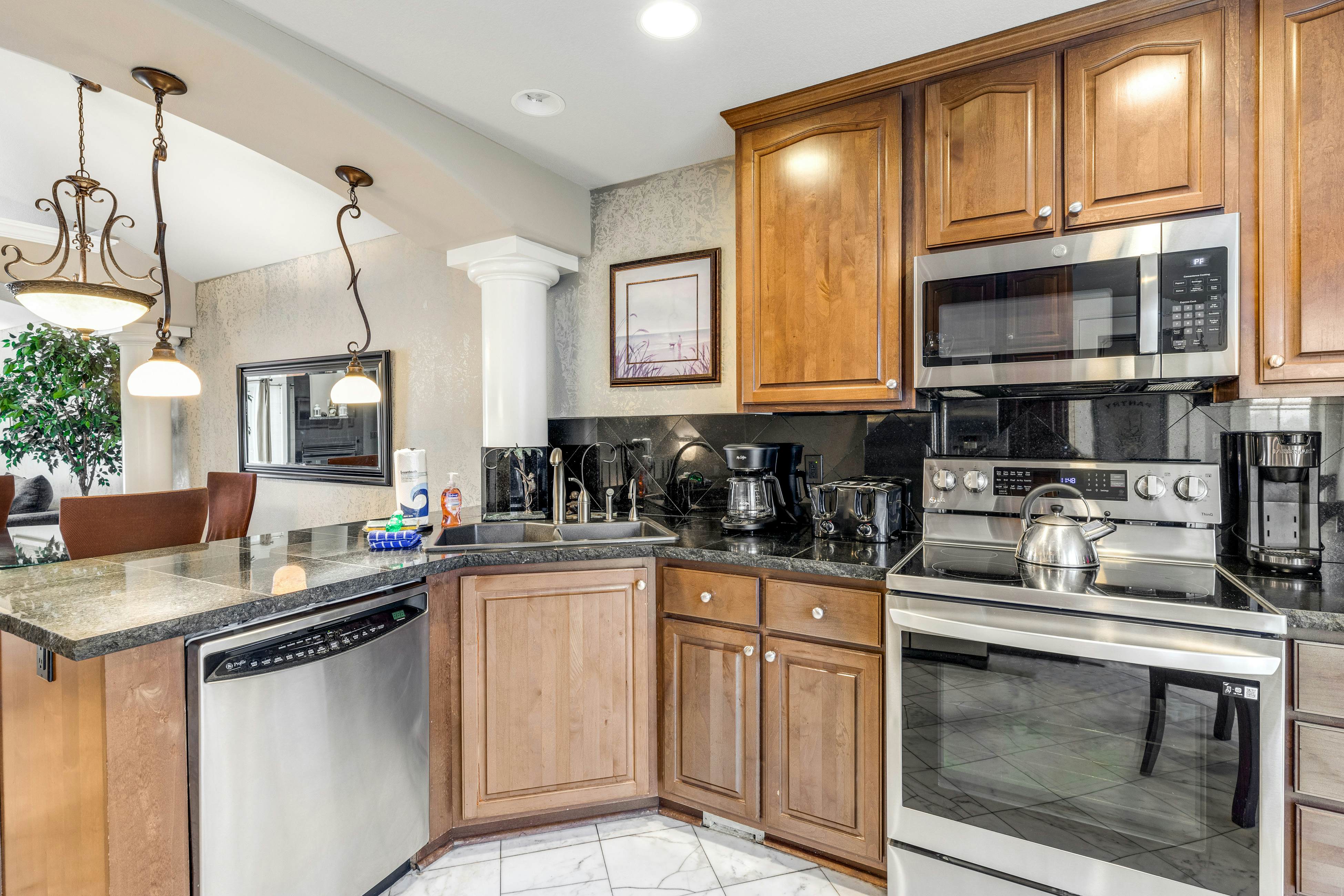 Oceanfront townhome with amazing views, decks, beach access, & updated kitchen